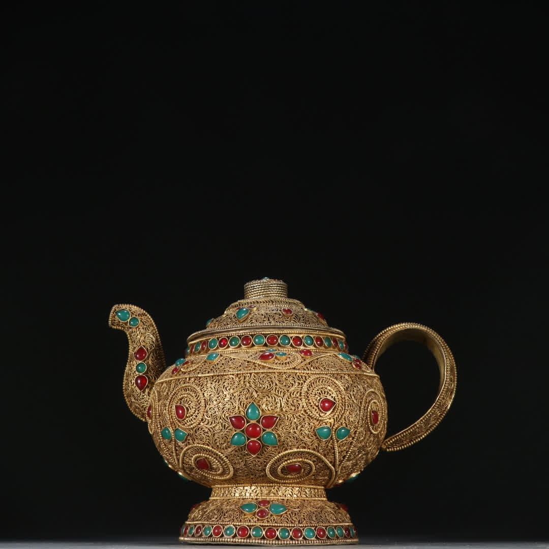 A Tang silver gilt cloisonné inlaid treasure teapot: Tang silver gilt cloisonné inlaid treasure teapot SIZE: H:15cm W:19cm W:565g (The Dimensions Of All Batches Are Manually Measured.If You Need More Detailed Information, Please Contact Our Customer Se