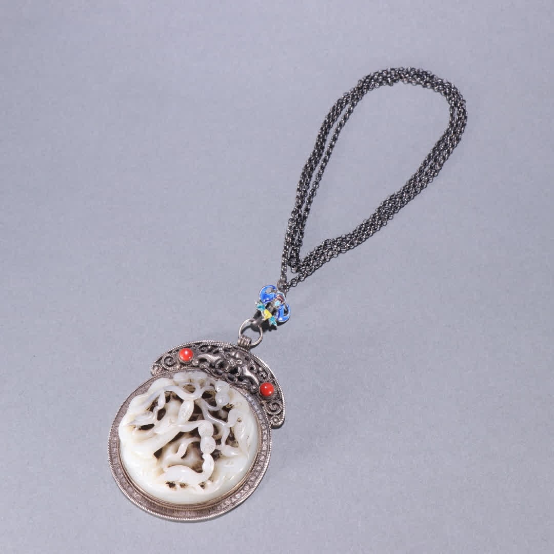 A Qing Dynasty silver-inlaid Hetian jade character story pendant (1 of 9)