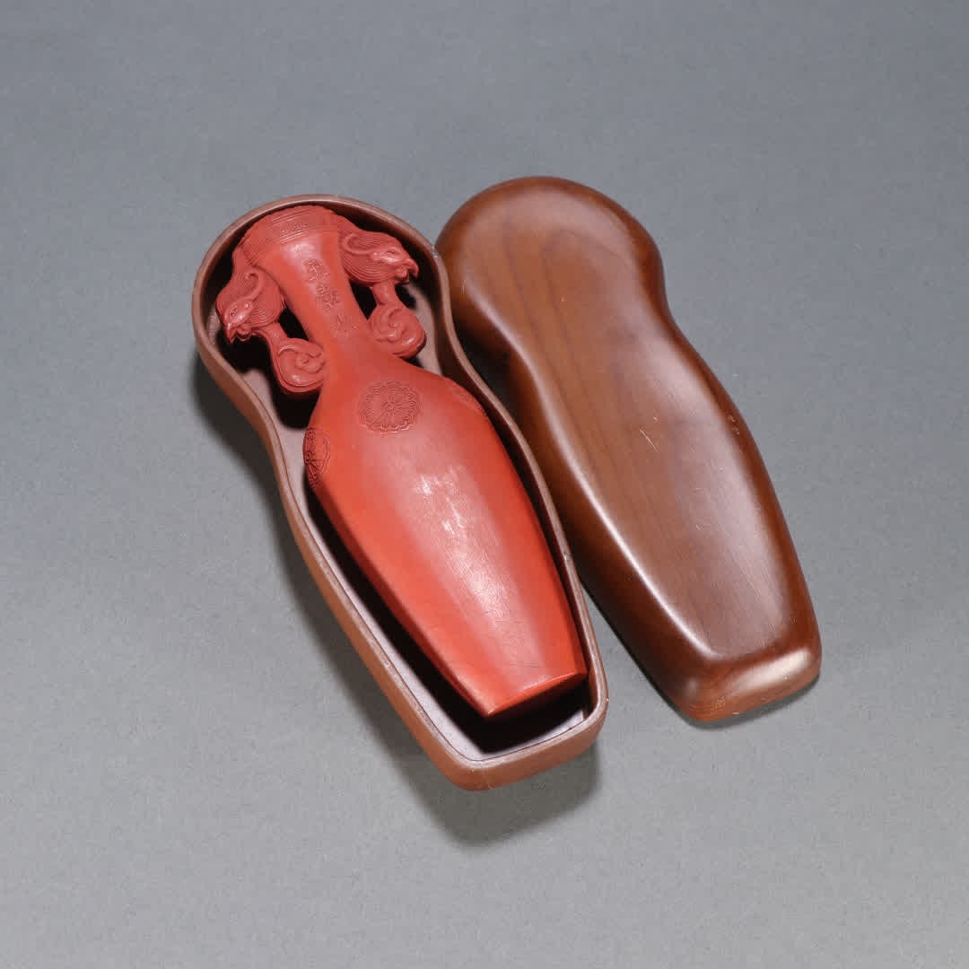 A Qing Dynasty cinnabar amphora ornament: Qing Dynasty cinnabar amphora study ornament SIZE: H:14.3cm W:5.1cm W:310g (The Dimensions Of All Batches Are Manually Measured.If You Need More Detailed Information, Please Contact Our