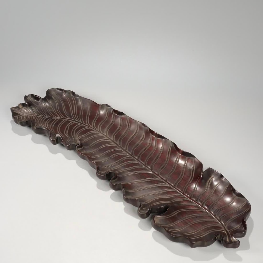 A Qing Dynasty sour branch wood carved banana leaf fruit plate (1 of 9)