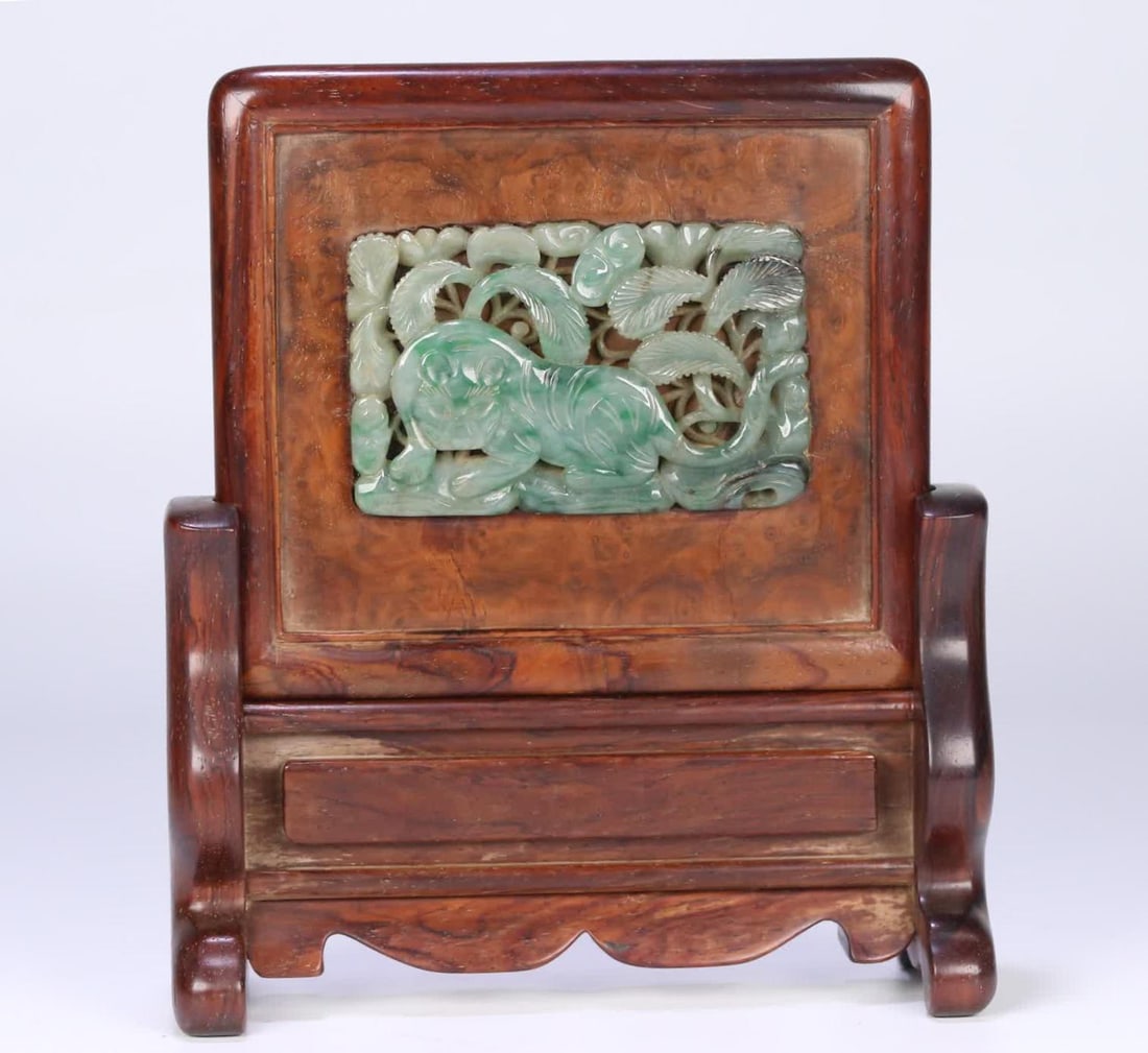 A piece of Qing Dynasty red sour branch shadow wood inlaid jade tiger insert (1 of 9)