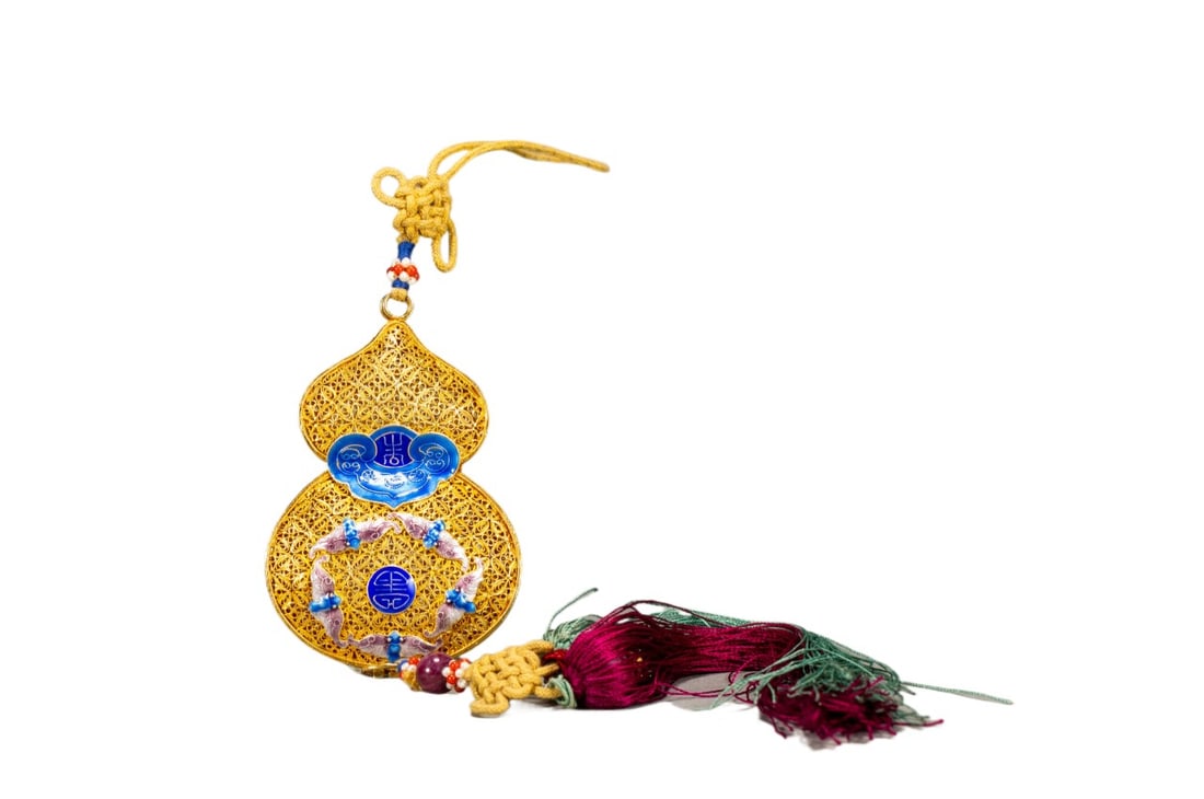 A Qing Dynasty copper gilt gourd sachet: Qing Dynasty copper gilt gourd sachet SIZE: L:9cm W:5cm (The Dimensions Of All Batches Are Manually Measured.If You Need More Detailed Information, Please Contact Our Customer Service Before Bidding.)