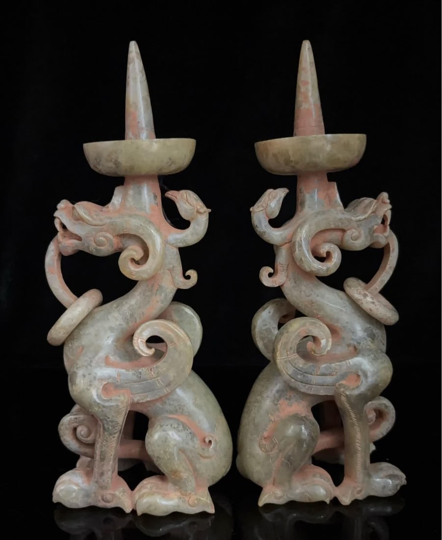 A pair of Han Dynasty jade dragon and phoenix candlesticks (1 of 9)