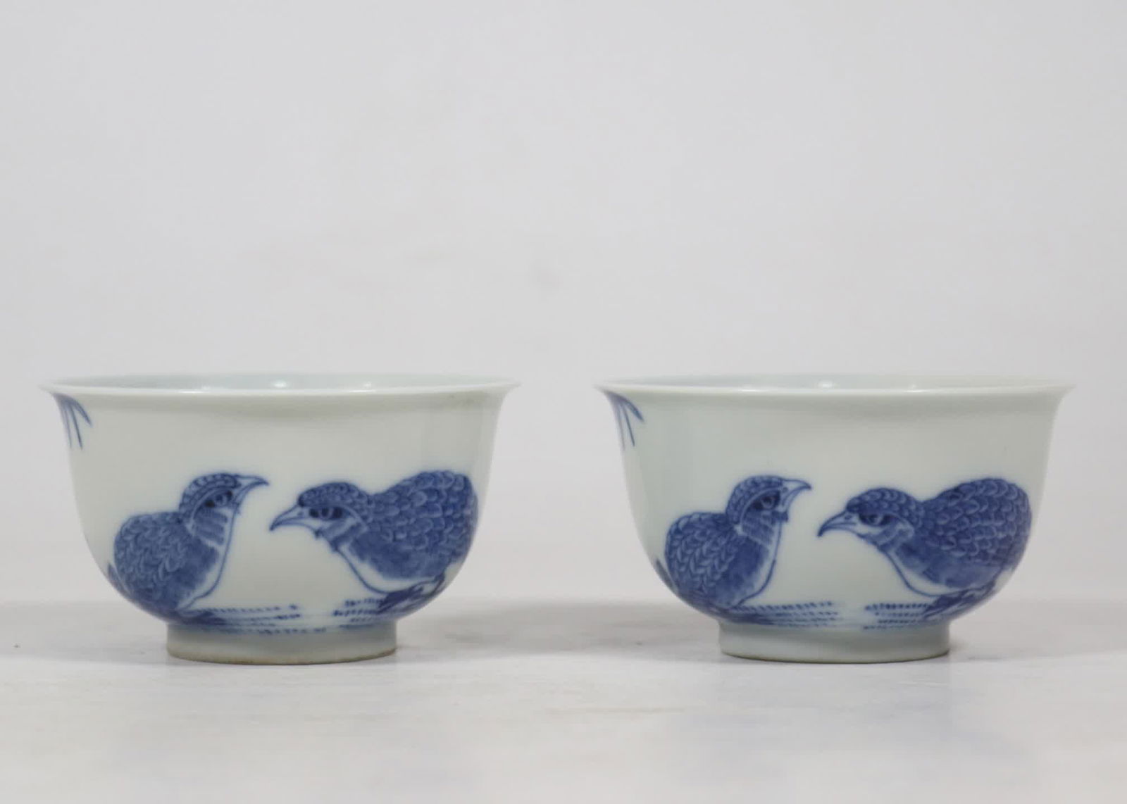 A pair of blue and white quail cups made in the Qing Yongzheng year (1 of 8)