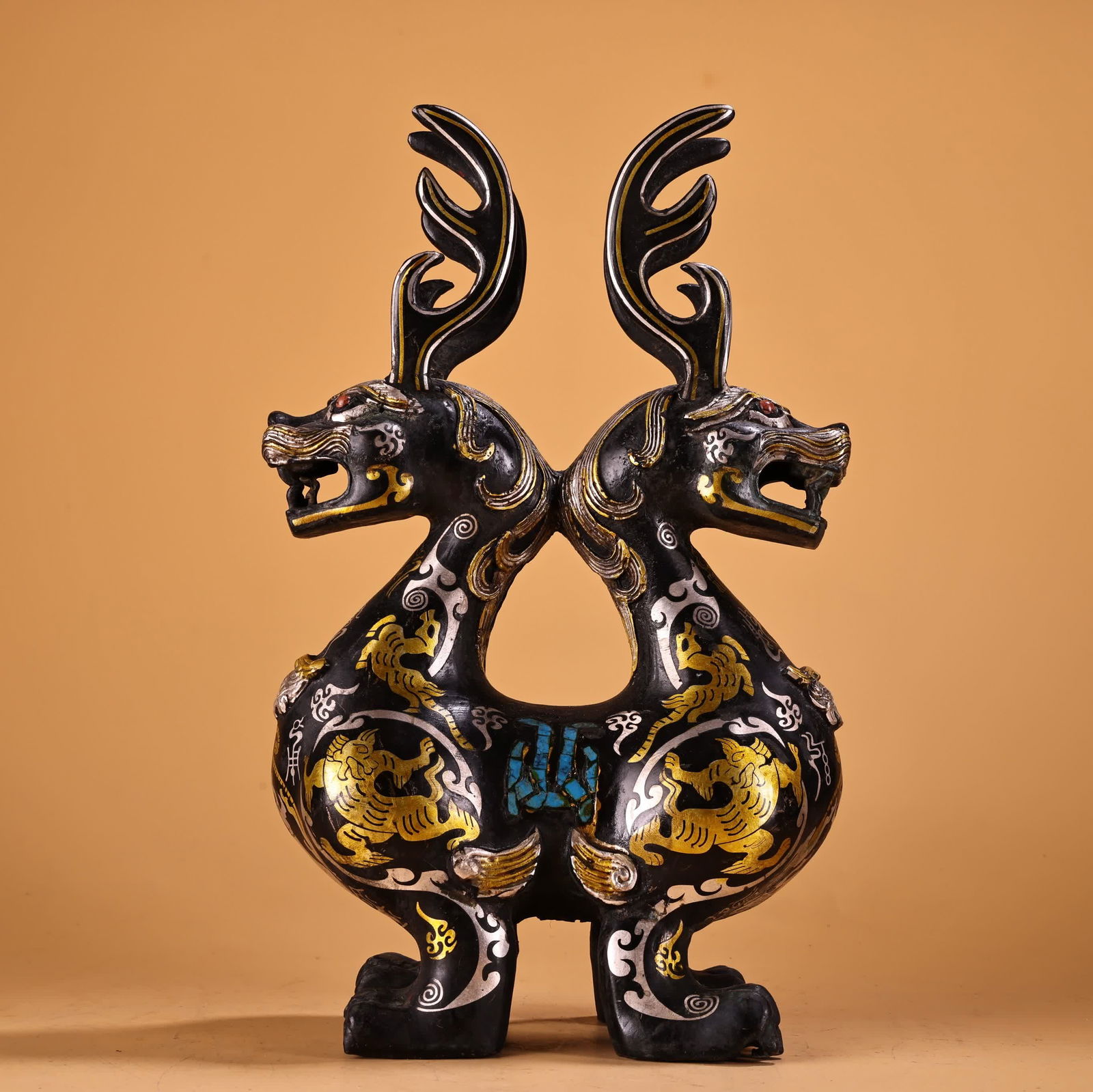 A bronze piece of gold and silver inlaid with gemstones turquoise two-headed beast (1 of 12)