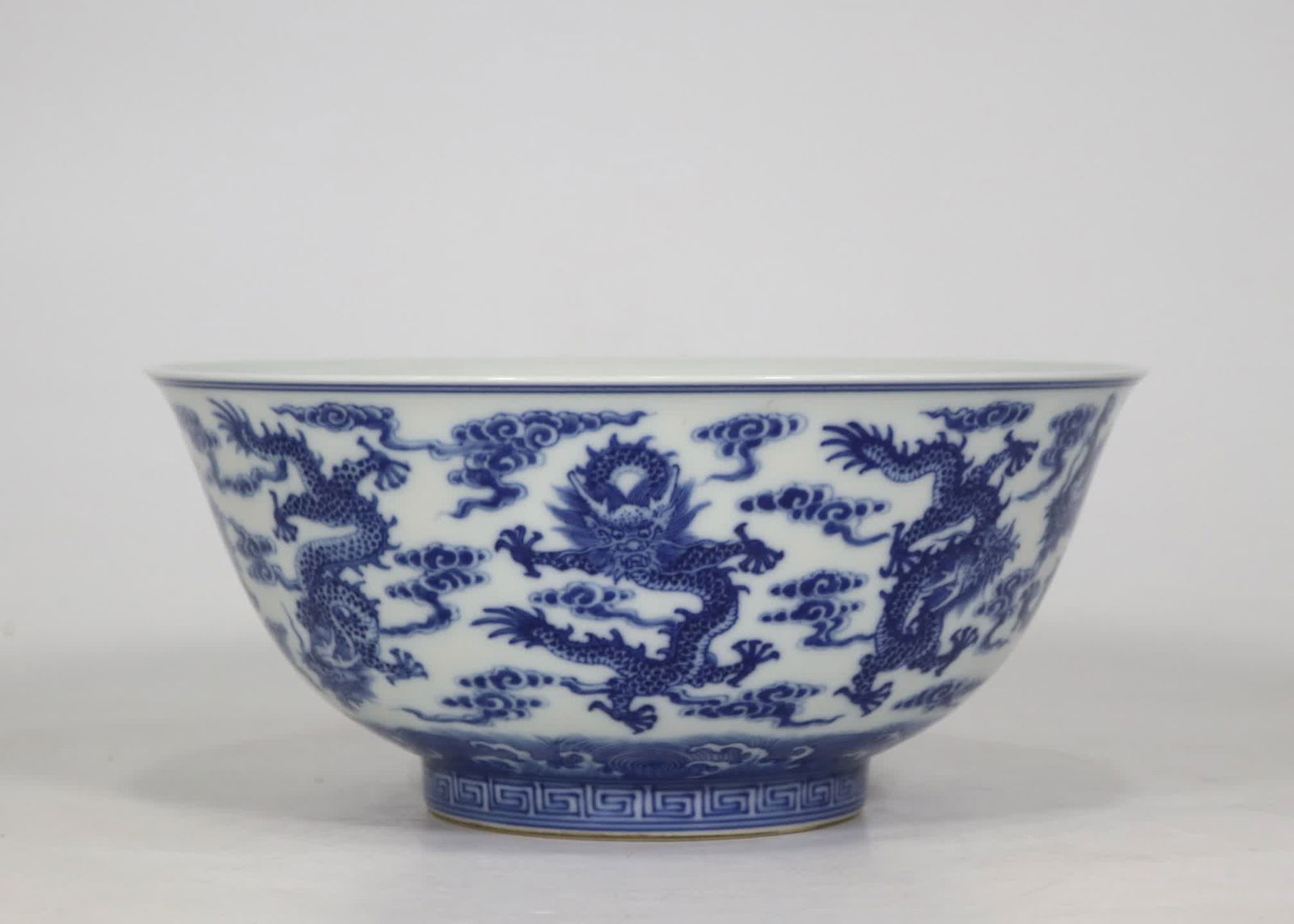 A blue and white nine-dragon bowl made in the Qianlong period of the Qing Dynasty: Qing Qianlong year blue and white nine dragon bowl SIZE: MouthD:22.8cm H:10cm (The Dimensions Of All Batches Are Manually Measured.If You Need More Detailed Information, Please Contact Our Customer Se