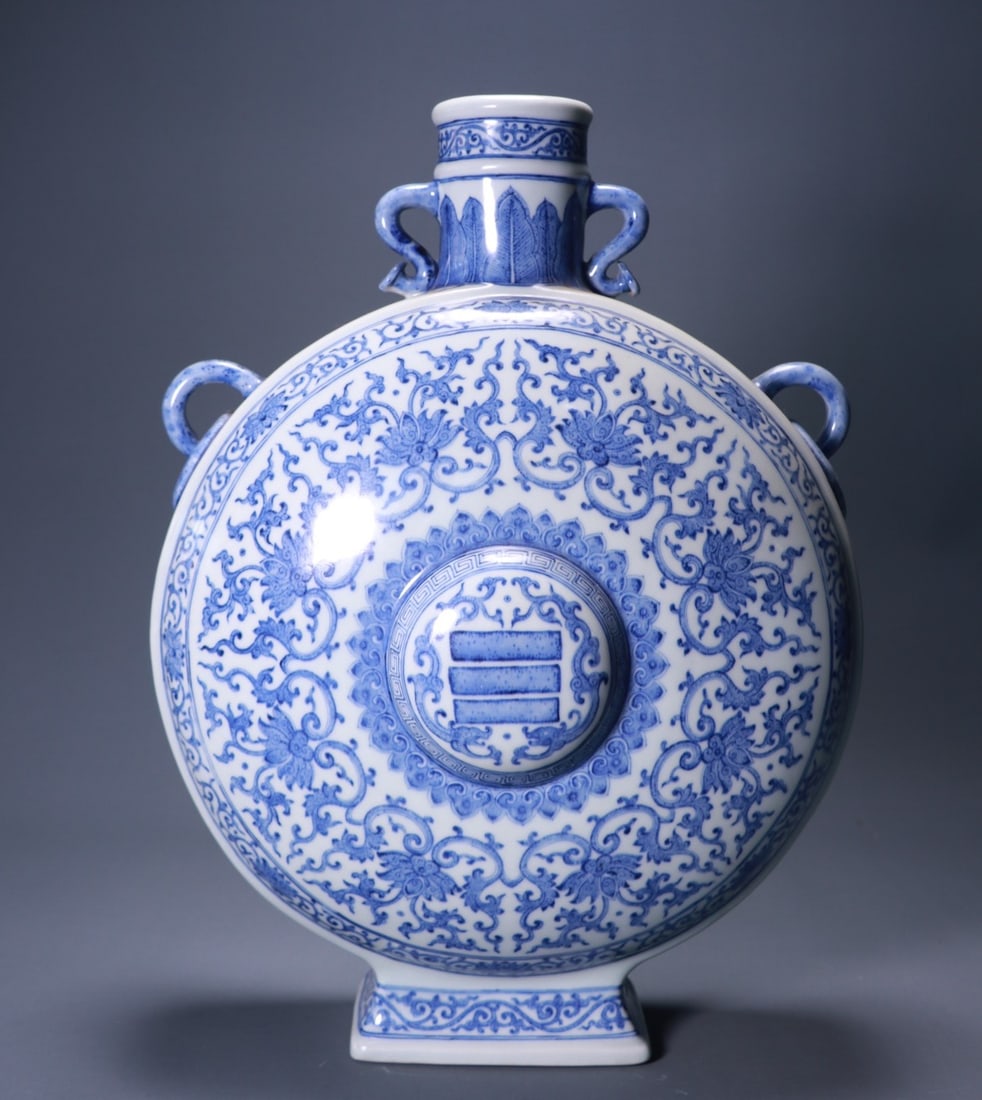 A blue and white entwined pattern moon vase made in the Qianlong period of the Qing Dynasty (1 of 9)