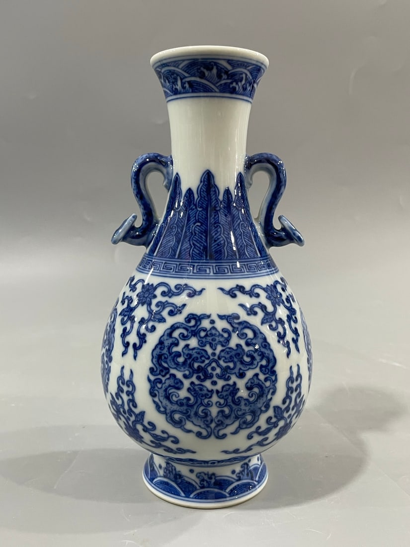 A Qing Dynasty Qianlong year made of entwined lotus pattern Tuan Kui Long Ruyi ear jade pot spring: Qing Dynasty's Qianlong year system of the entwined lotus pattern group Kuilong Ruyi ear jade pot spring Size:H:20cmBellydiameter10cm (The Dimensions Of All Batches Are Manually