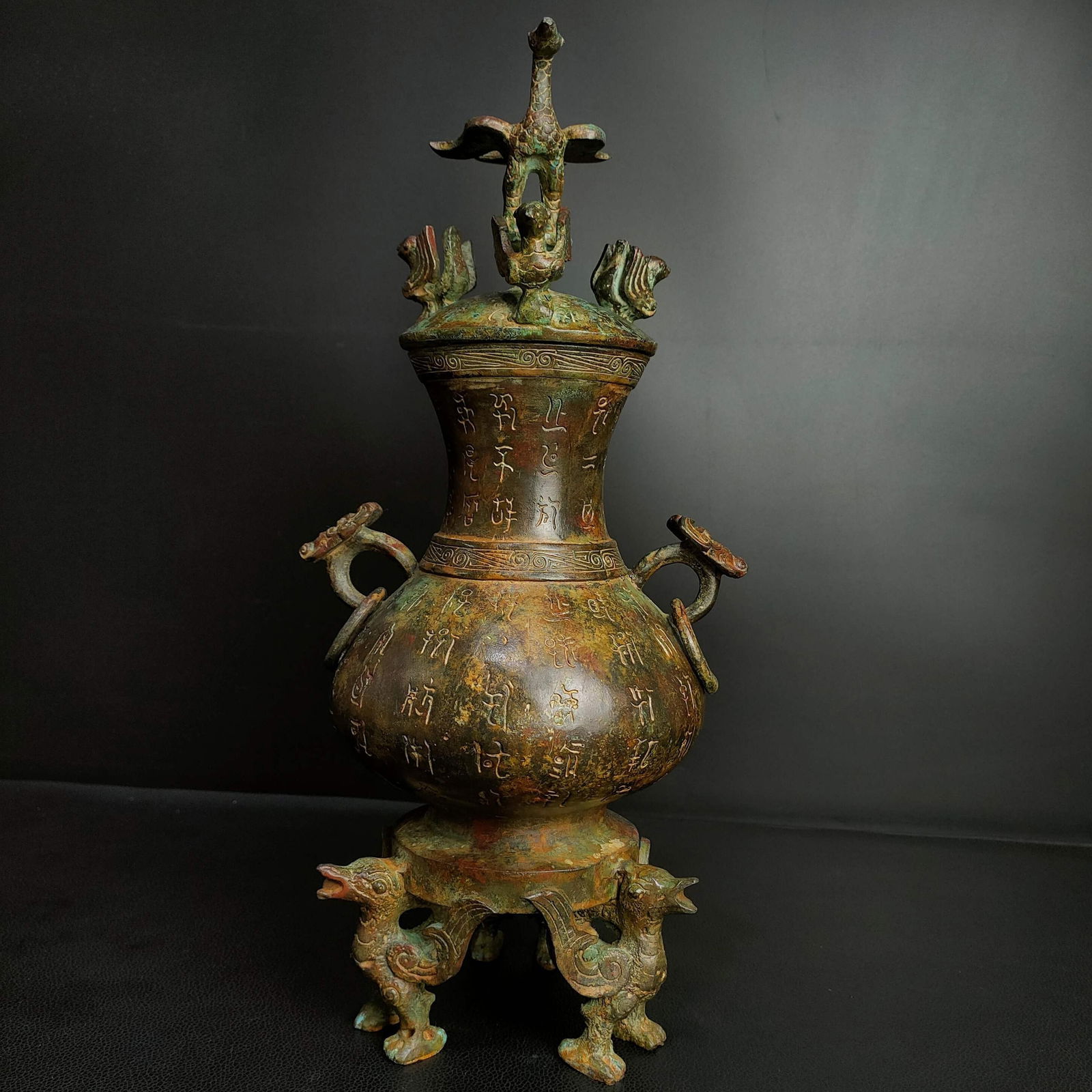 A bronze inscription standing bird vase from the Warring States period (1 of 9)