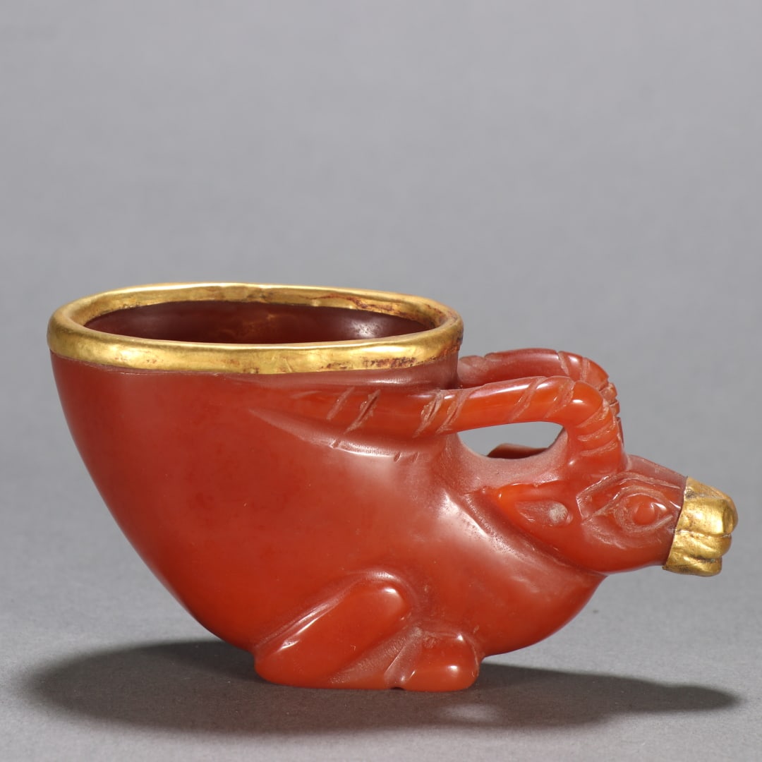 An agate sheep's head cup from the Liao and Jin dynasties: Agate sheep's head cup in the Liao and Jin dynasties Size:H:5.3cmW:10.2cmW:0.17kg (The Dimensions Of All Batches Are Manually Measured.If You Need More Detailed Information, Please