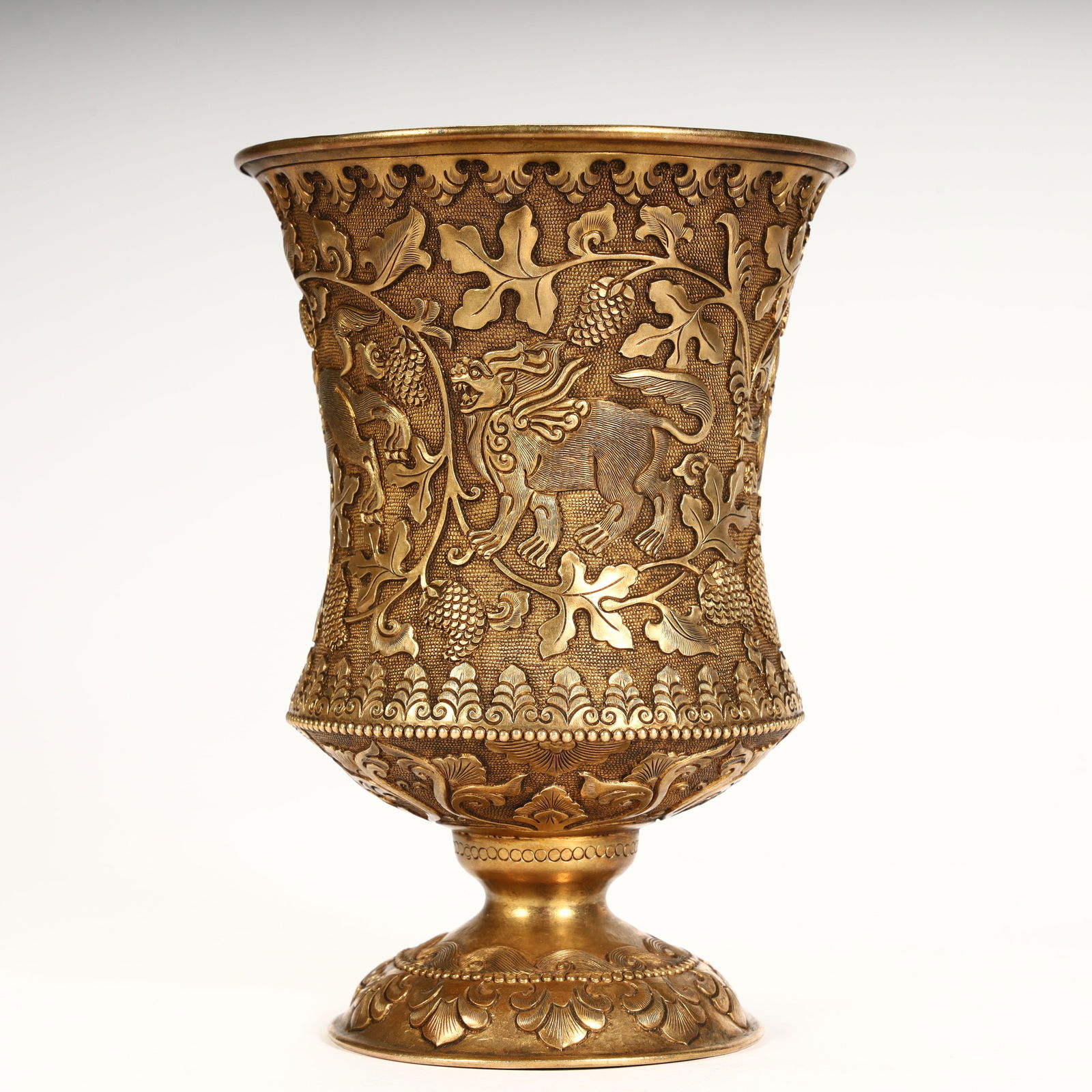 A fine copper-gilt grape-patterned goblet. - 5
