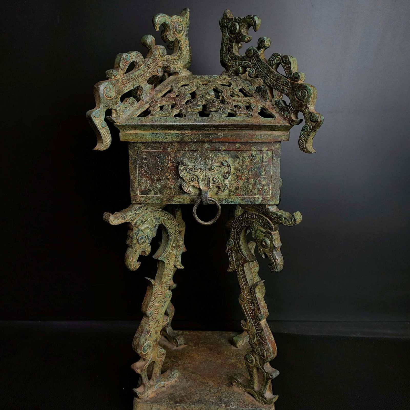 A bronze four phoenix smoke from the Warring States period: Bronze Four Phoenixes in the Warring States Period Size:H:38cmW:18cmW:4.7kg (The Dimensions Of All Batches Are Manually Measured.If You Need More Detailed Information, Please