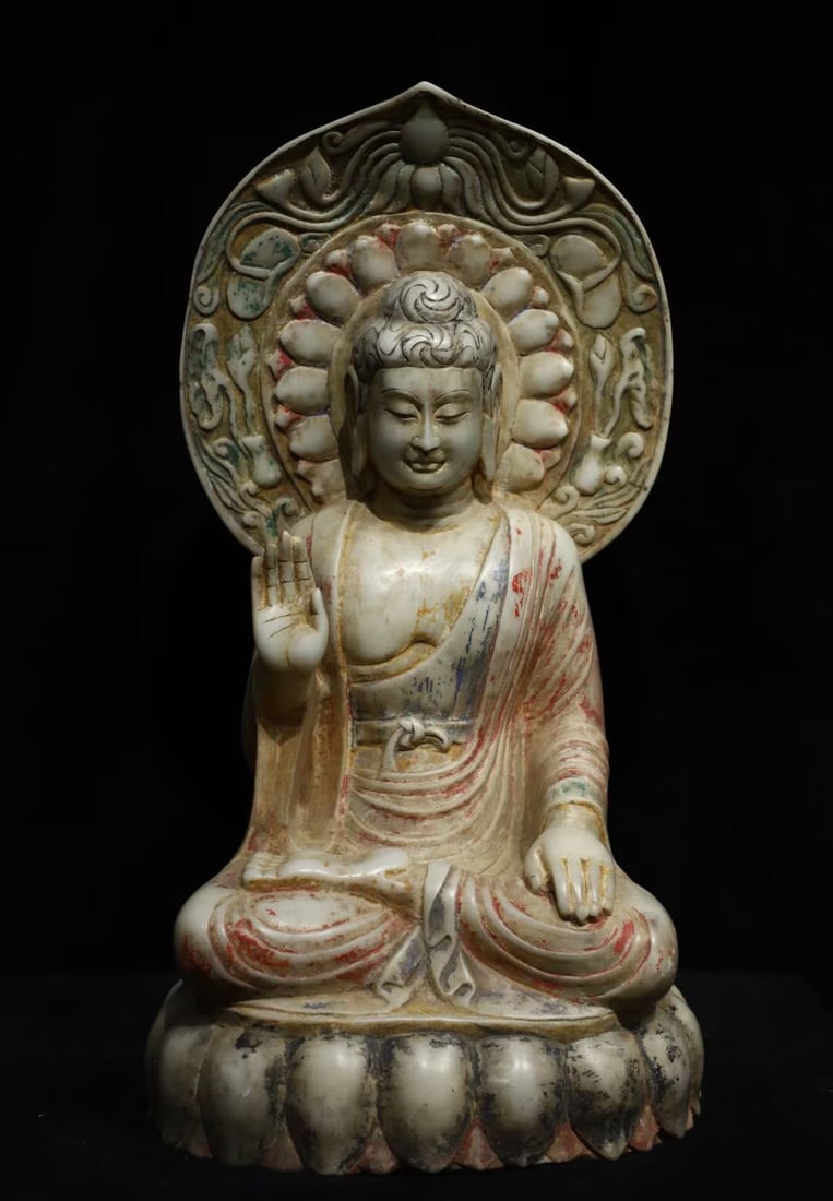 A white jade painted Shakyamuni backlit seated Buddha from the Qi Dynasty: The white jade painted Shakyamuni backlit seated Buddha of the Qi Dynasty Size:H:66cmW:36cmT:30cm (The Dimensions Of All Batches Are Manually Measured.If You Need More Detailed