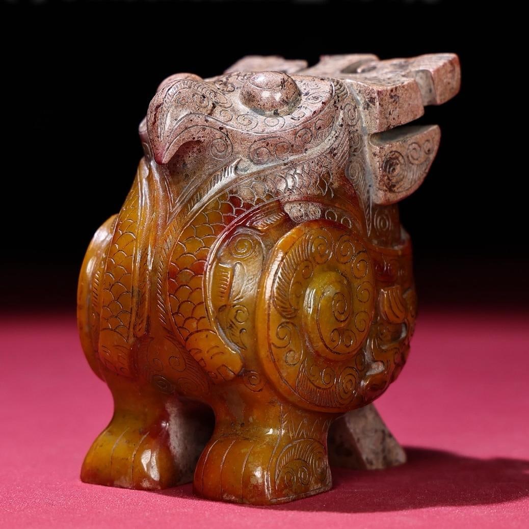 A beautiful raw pit full of Qin Hetian jade owl handle (1 of 9)