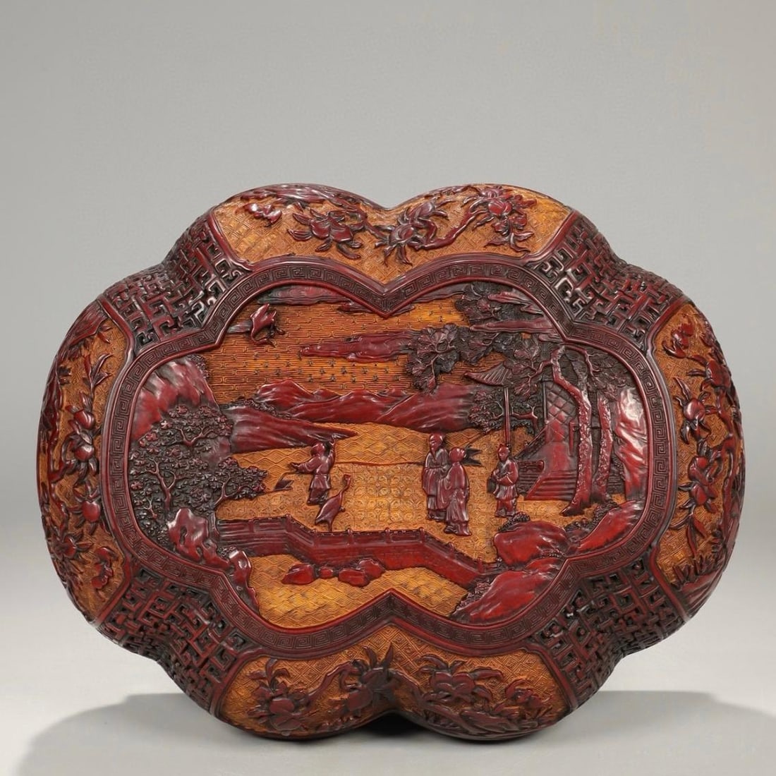 A Qing Dynasty red lacquerware Qianlong imperial holding box (1 of 9)