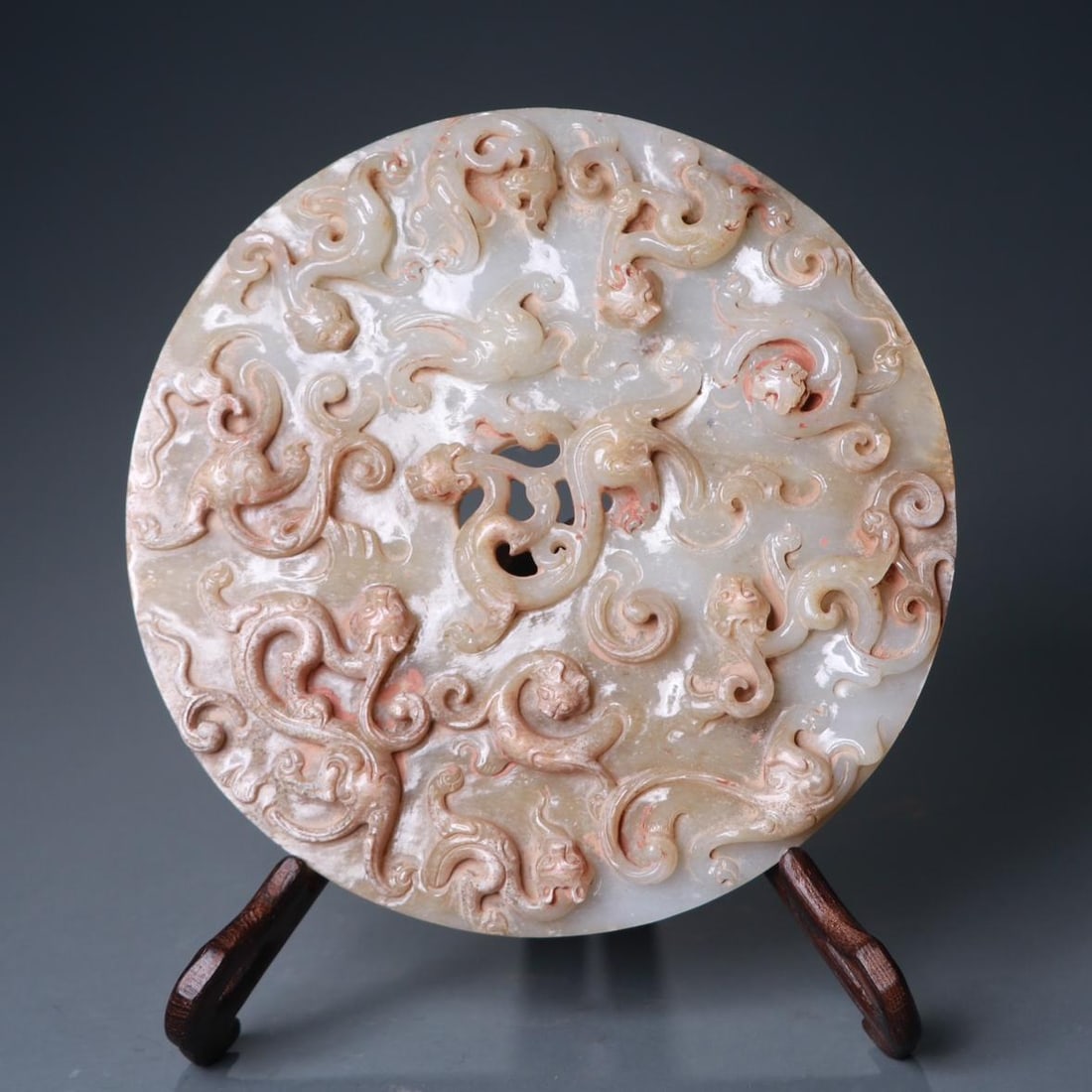 A beautiful Hetian jade dragon pattern valley pattern: Exquisite Hetian jade dragon pattern valley pattern Size:D:18cmT:1.8cmW:0.777kg (The Dimensions Of All Batches Are Manually Measured.If You Need More Detailed Information, Please Contact Our Customer