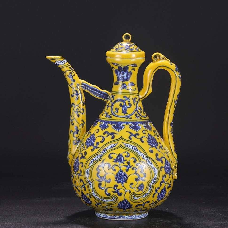 A large pot with a yellow background blue and white entwined floral pattern made in the Xuande era (1 of 9)