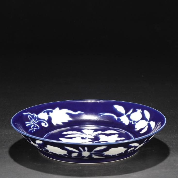 A large plate with sapphire blue glaze blank and carved branches and floral patterns made in the (1 of 7)