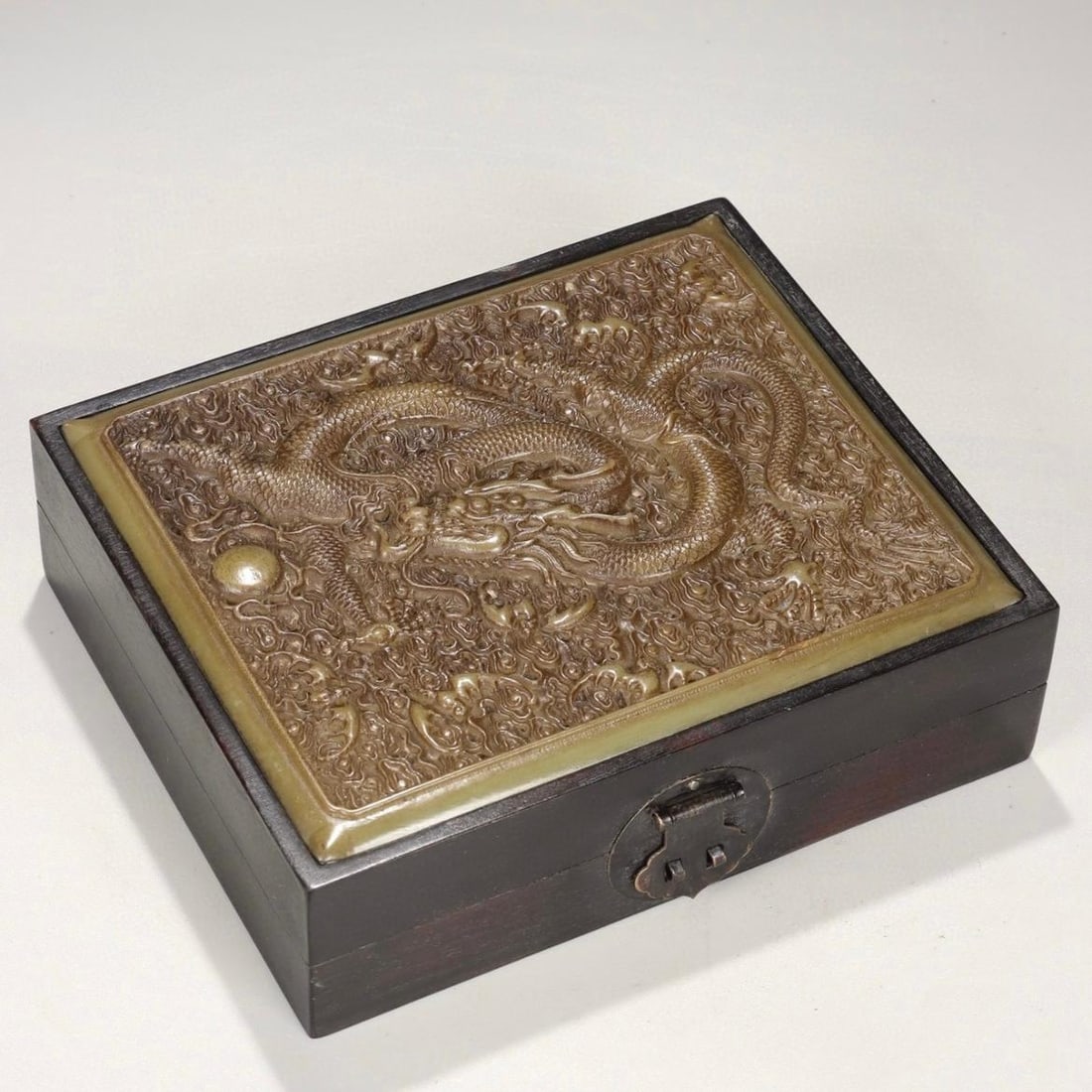 A Qing Dynasty rosewood inlaid Qingtian stone carved dragon pattern incense box (1 of 9)