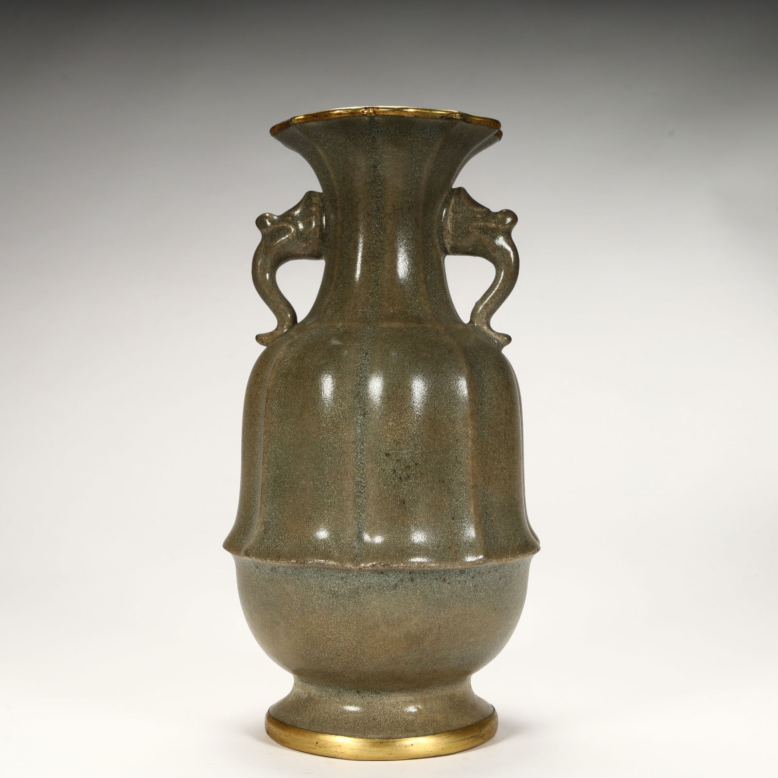 A gilt vase with blue glazed animal ears from the Song Dynasty: Song Dynasty celadon animal ear gilt vase SIZE: H:19cm L: 9cm W:9cm W:302g (The Dimensions Of All Batches Are Manually Measured.If You Need More Detailed Information, Please Contact