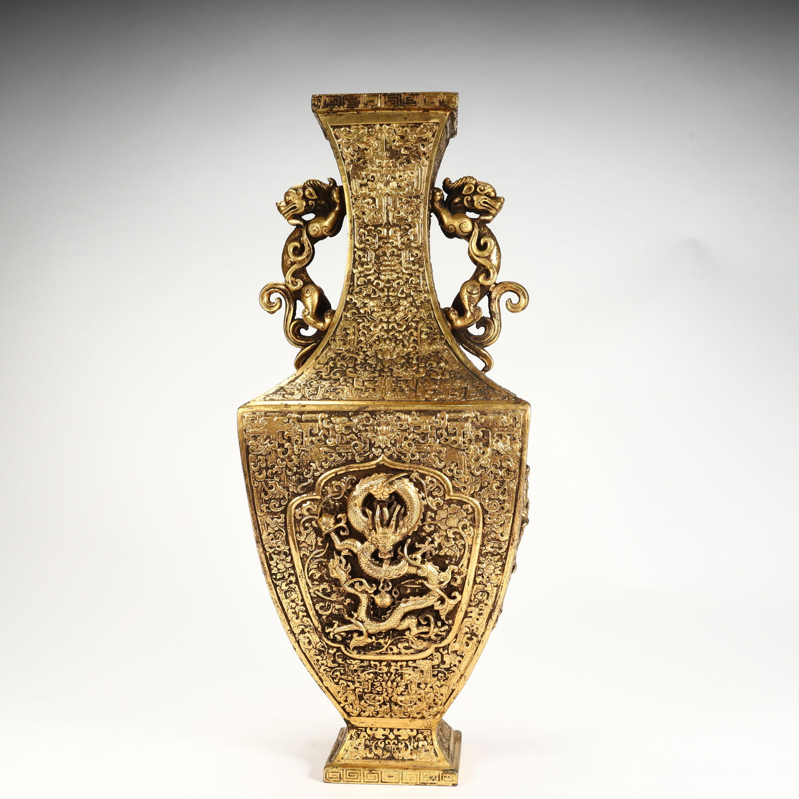 A copper-gilt relief dragon pattern double dragon ear square vase from the Qing Dynasty (1 of 9)