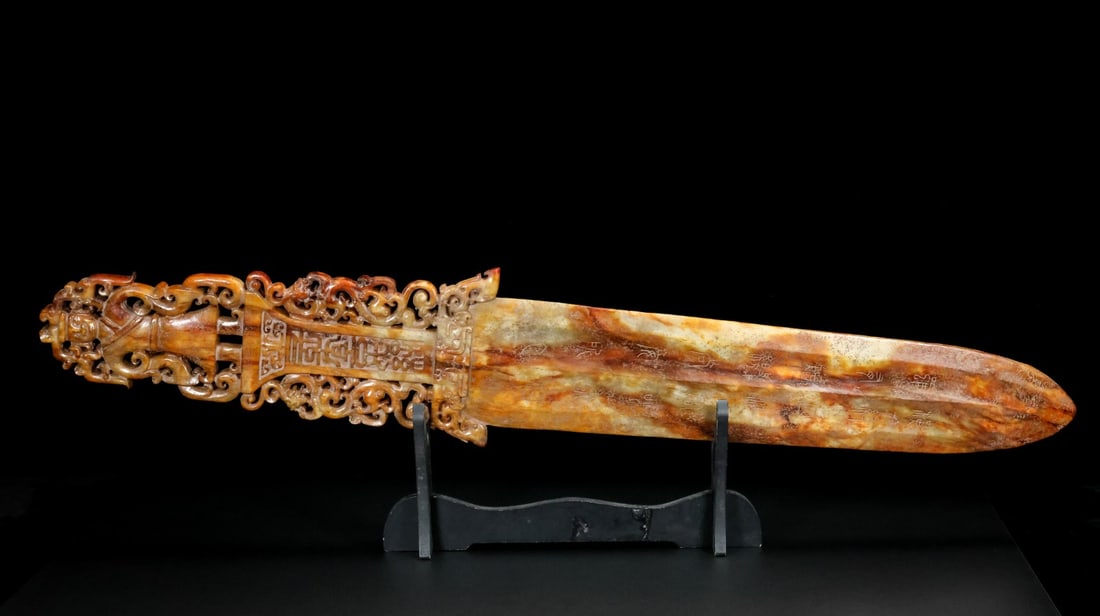 A beautiful Hetian jade Changyi descendant sword: Exquisite Hetian jade Changyi descendant sword Size:L:75cmW:13cm T:1.6cmW:2kg (The Dimensions Of All Batches Are Manually Measured.If You Need More Detailed Information, Please Contact Our Customer Se