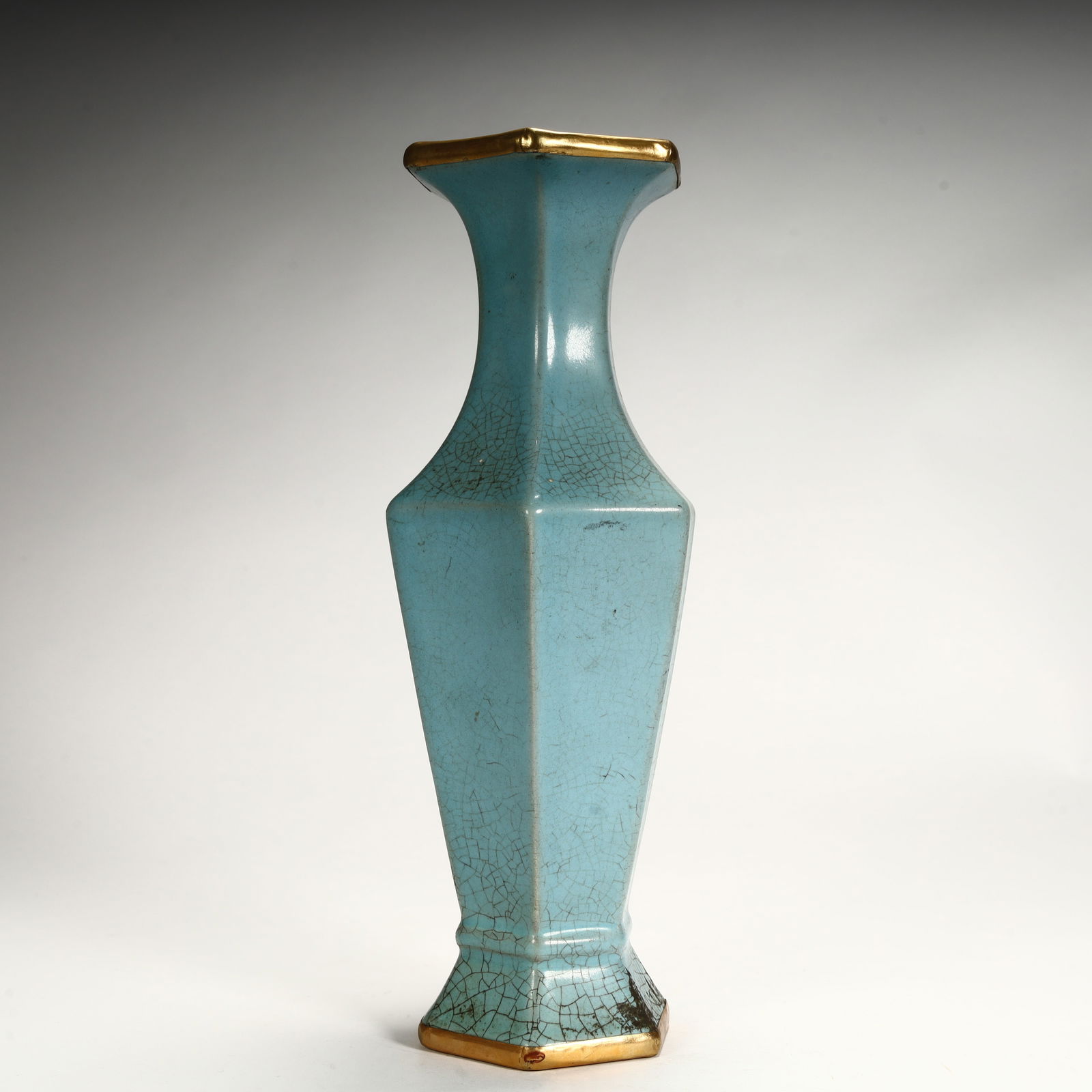 An open gilt hexagonal vase from the Ru kiln in the Song Dynasty: The open gilt hexasquare bottle of the Ru kiln in the Song Dynasty SIZE: H:23cm L: 10cm W:8cm W:436g (The Dimensions Of All Batches Are Manually Measured.If You Need More Detailed