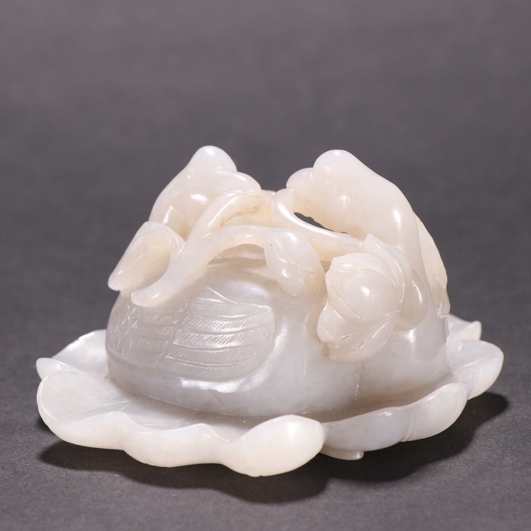 A lotus ornament of Hetian white jade goose in the Qing Dynasty (1 of 7)
