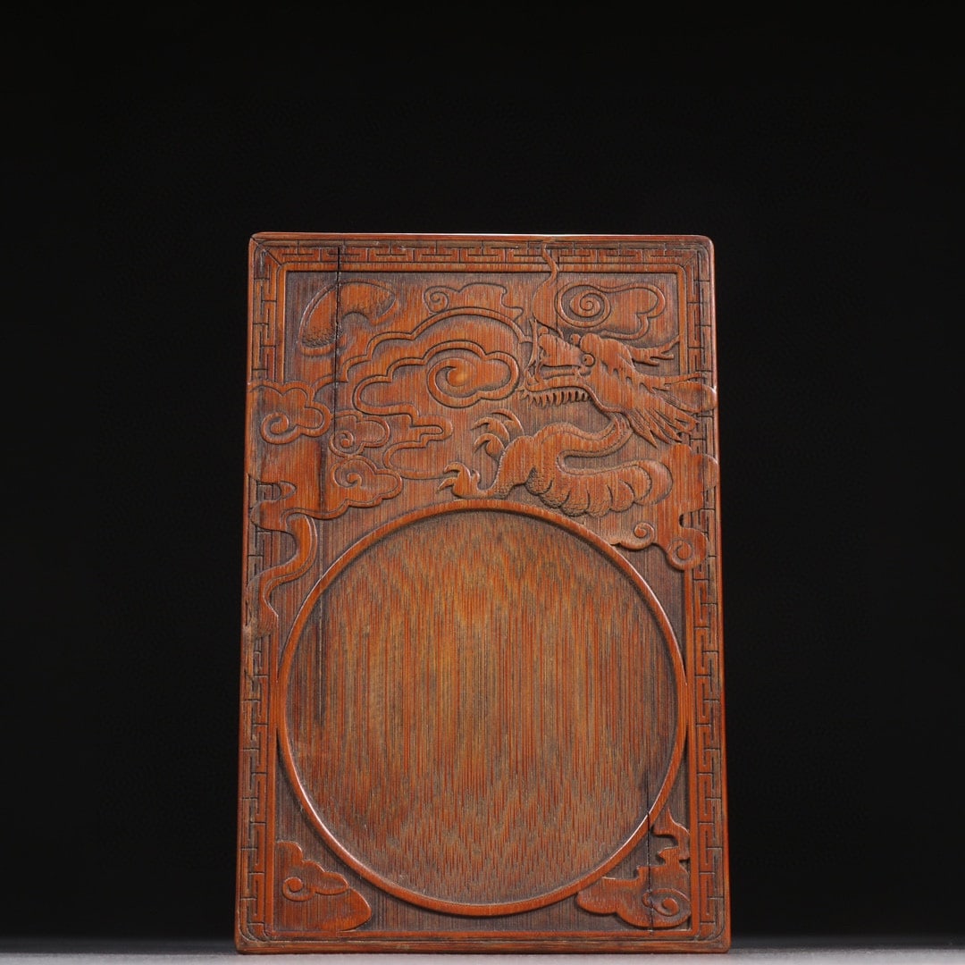 A beautiful bamboo carved cloud dragon pattern inkstone: Exquisite bamboo carved cloud dragon pattern inkstone Size:L:15cmW:10cmH:2.5cm (The Dimensions Of All Batches Are Manually Measured.If You Need More Detailed Information, Please