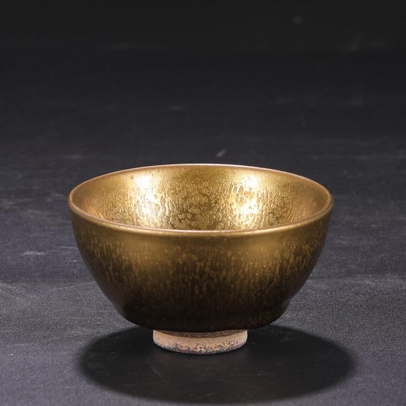 A gold-glazed oil drip cup built in the Song Dynasty: The gold glaze oil dripping cup of the kiln built in the Song Dynasty Size:H:5.5cmCalibre9.5cm (The Dimensions Of All Batches Are Manually Measured.If You Need More Detailed