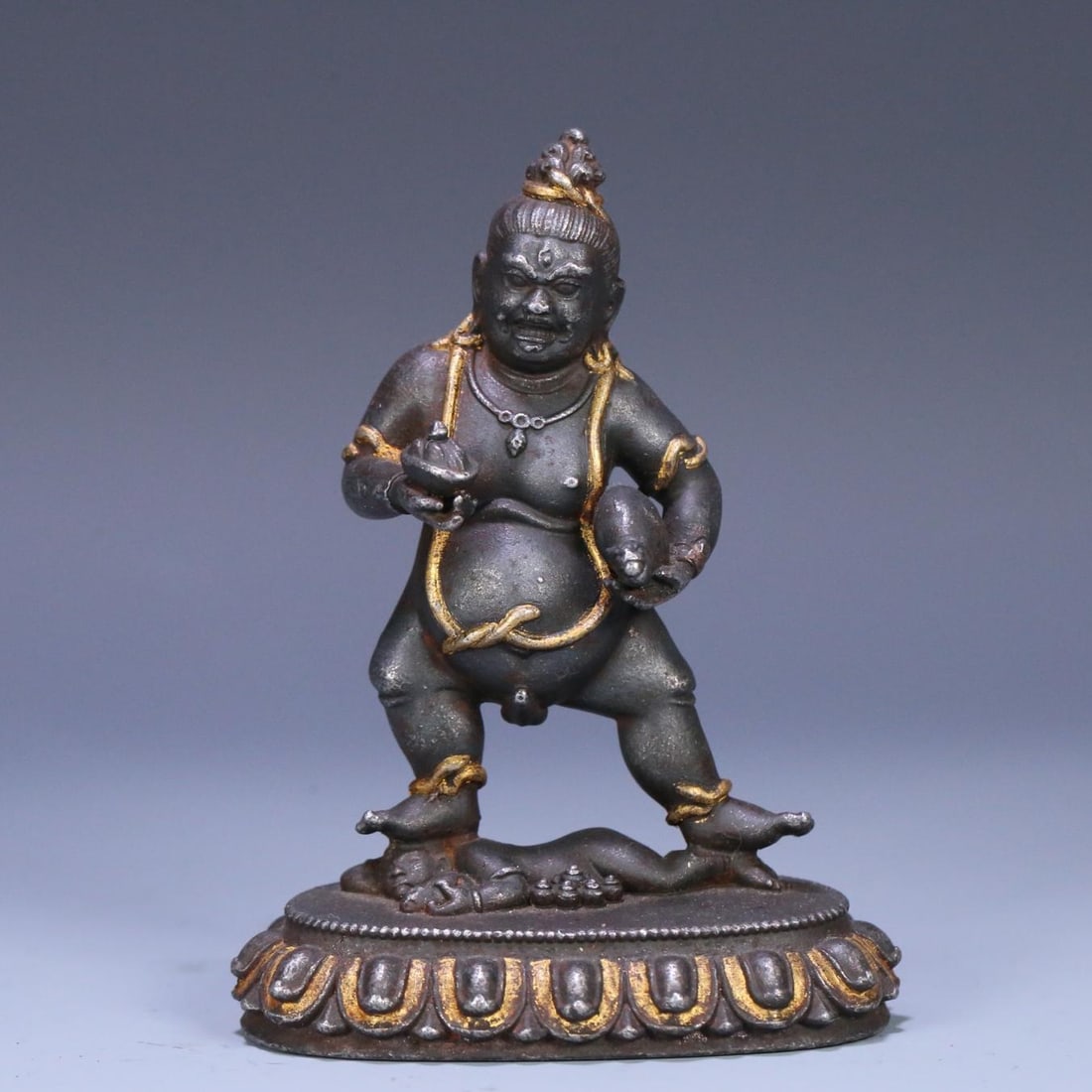 A 17th-century iron-cut gold black statue of the God of Wealth (1 of 9)