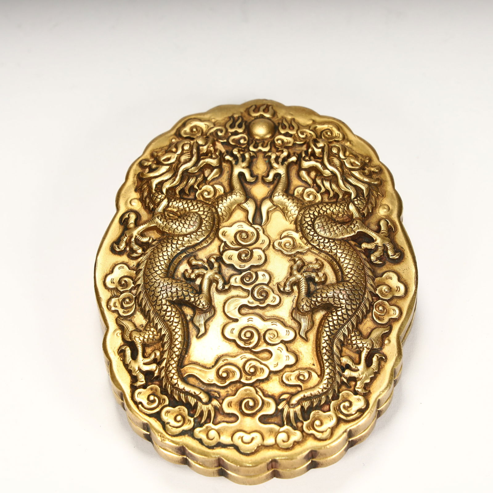 A copper-gilt double dragon pattern box from the Qing Dynasty (1 of 8)