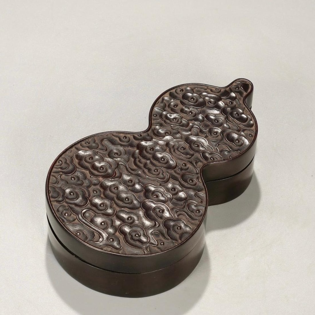 A mahogany carved auspicious cloud pattern gourd incense box from the Qing Dynasty (1 of 9)