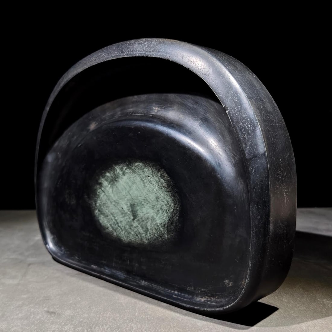 A Wang Guxiang Taohe inkstone: Wang Guxiang's Taohe inkstone Size:L:30cmW:22.8cm T:5cm (The Dimensions Of All Batches Are Manually Measured.If You Need More Detailed Information, Please Contact Our Customer Service Before Bidding.)