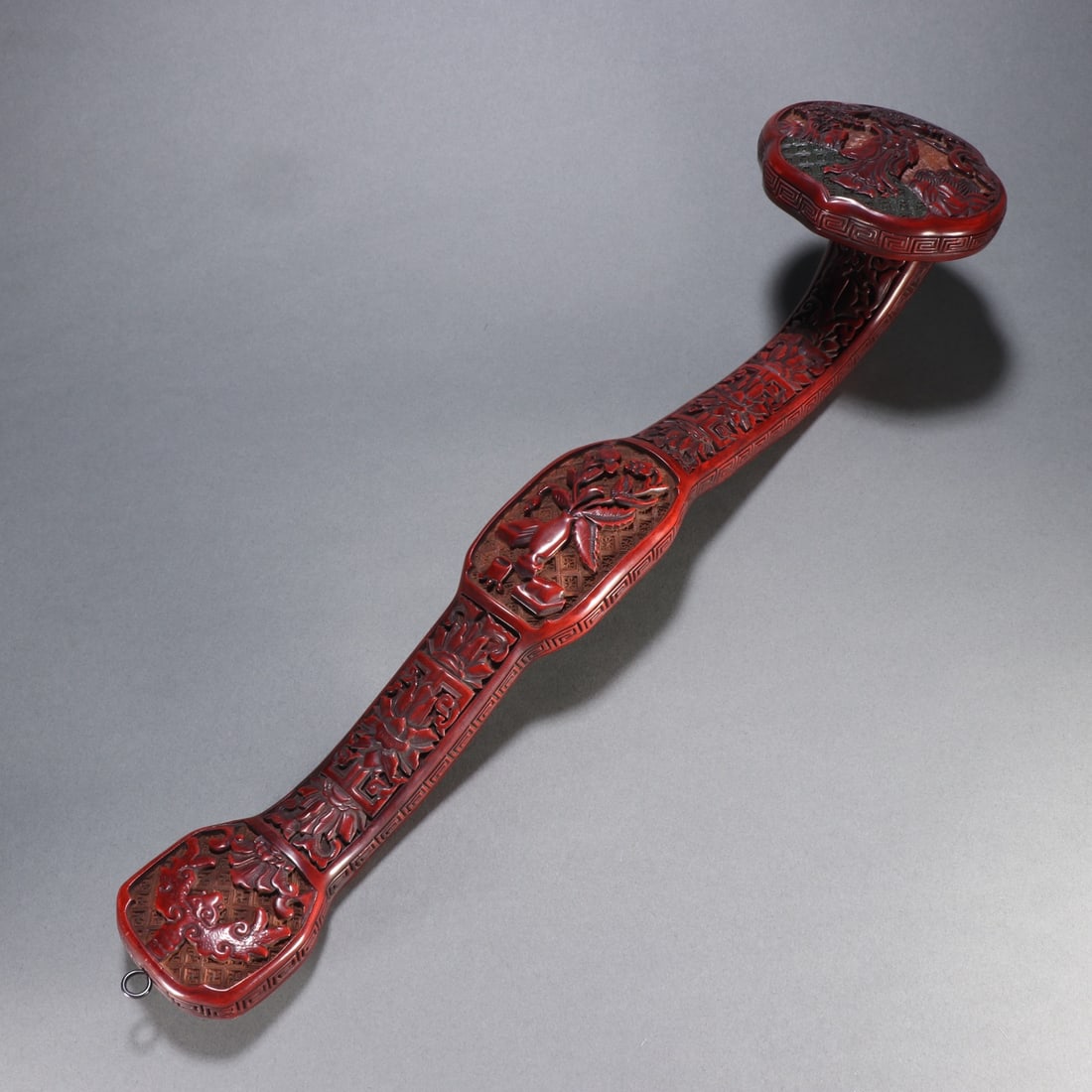 A Qing Dynasty red character story ruyi handle (1 of 9)