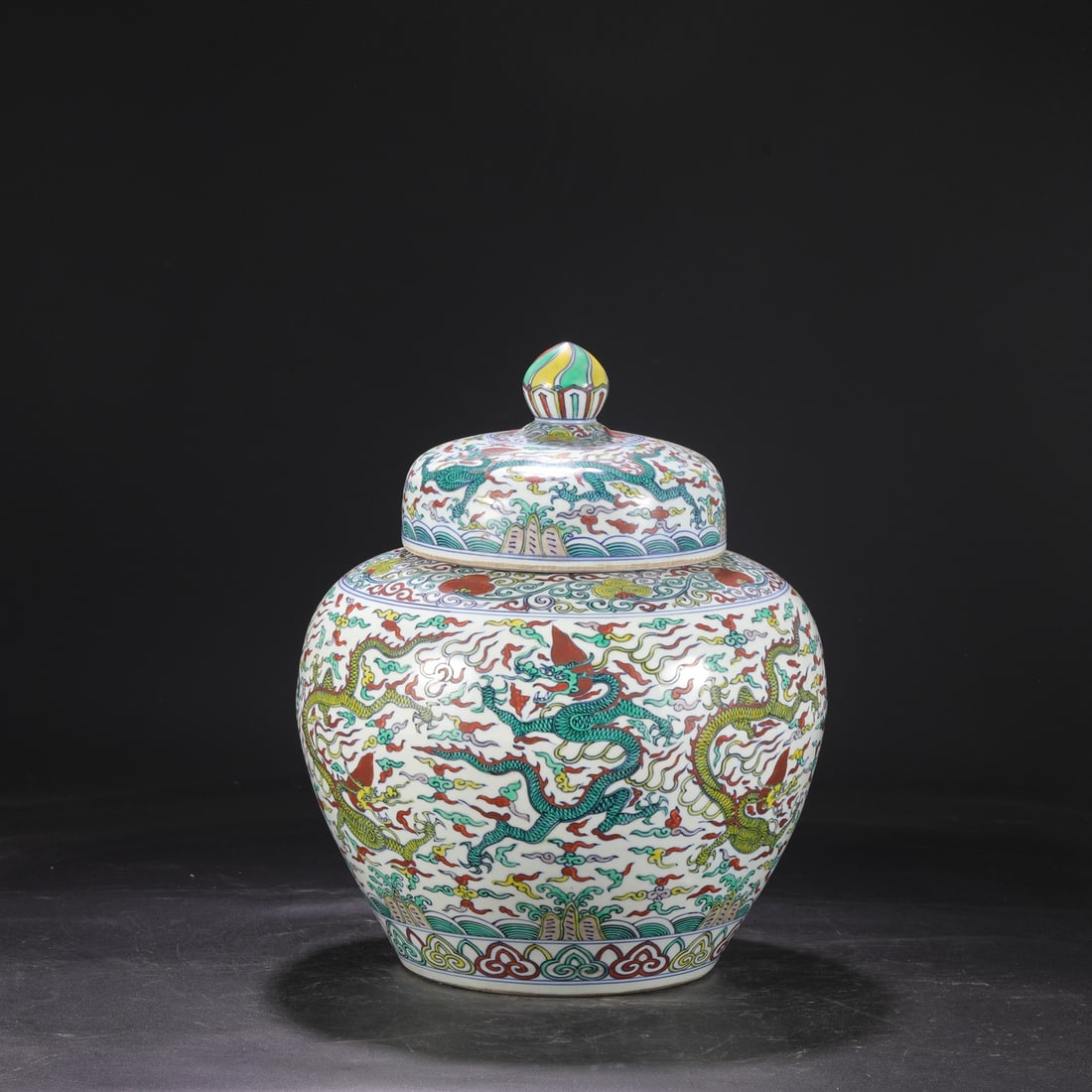 A large lid jar with a blue and white colorful seawater nineteen dragon pattern made in the Jiajing (1 of 9)