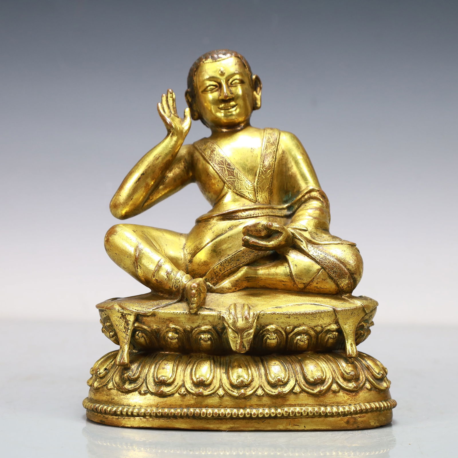A Exquisite Gilt Bronze Statue of Mammon: A Exquisite Gilt Bronze Statue of Mammon Ming Dynasty, China Size:15cmx9cmx17.5cm Weight:1800g (The Dimensions Of All Batches Are Manually Measured.If You Need More Detailed Information, Please