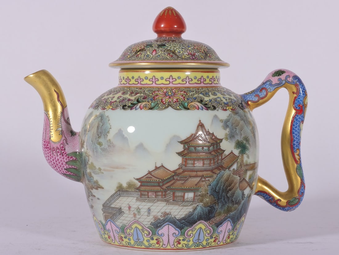 An Exquisite Famille-Rose Lotus Pattern Landscape Pattern Teapot: An Exquisite Famille-Rose Lotus Pattern Landscape Pattern Teapot Qing Dynasty, China Qianlong Six-character Mark Size:16cmx11cm (The Dimensions Of All Batches Are Manually Measured.If You Need More