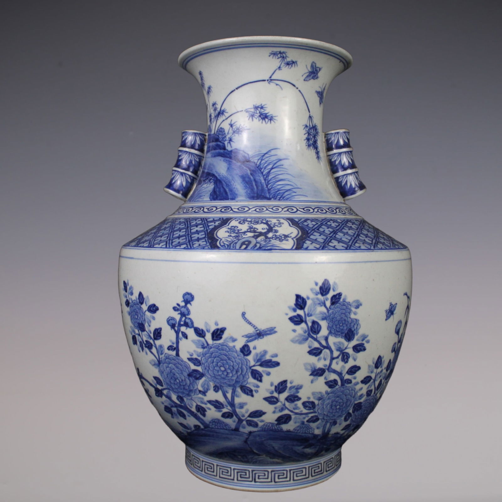 An Exquisite Blue and White Flower and Bird Pattern Double-Ears Jar: An Exquisite Blue and White Flower and Bird Pattern Double-Ears Jar Qing Dynasty, China Qianlong Six-character Mark Size:39.5cmx15cm (The Dimensions Of All Batches Are Manually Measured.If You Need