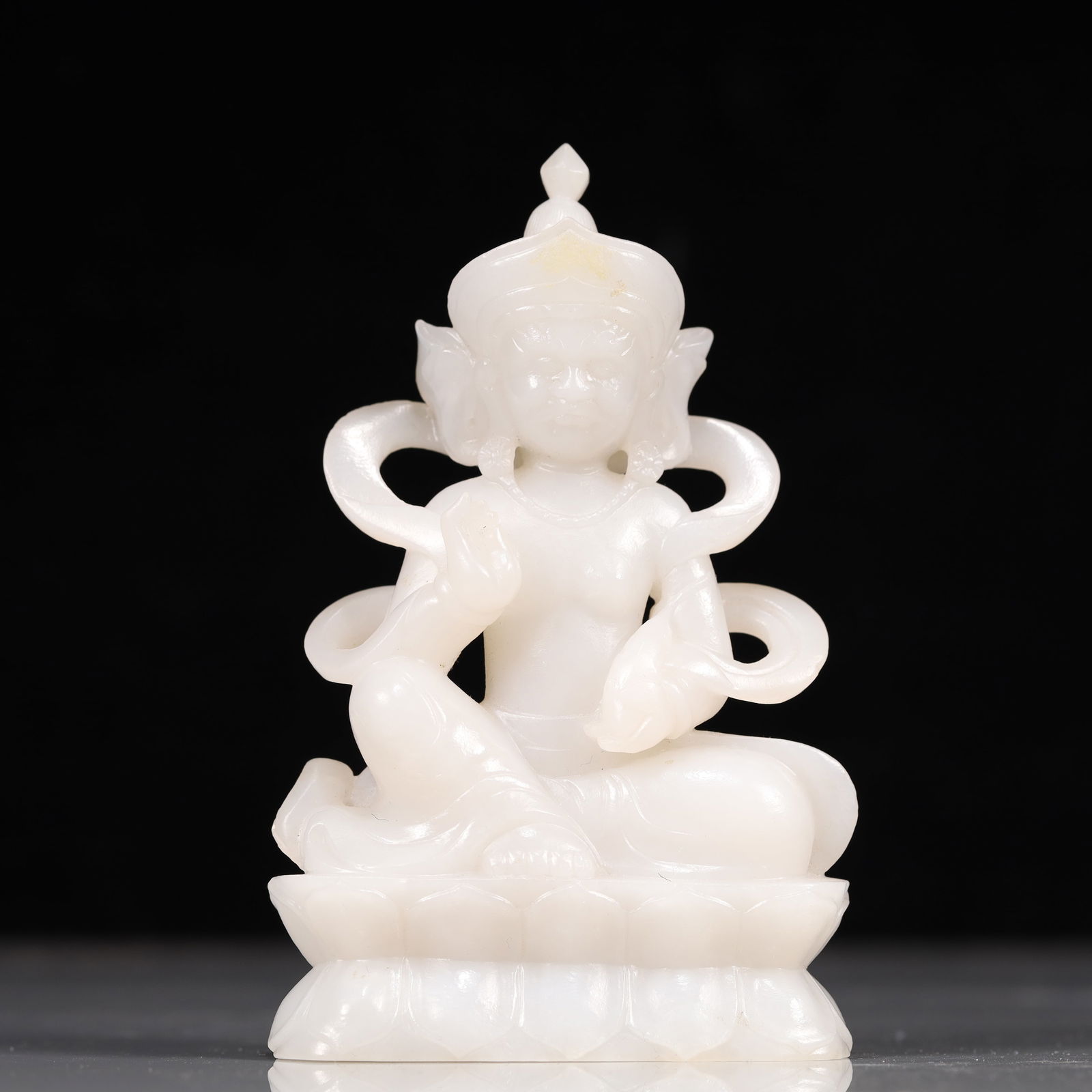 A Exquisite White Jade Statue of Mammon: A Exquisite White Jade Statue of Mammon Qing Dynasty, China Size:8cmx3cmx12.5cm Weight:300g (The Dimensions Of All Batches Are Manually Measured.If You Need More Detailed Information, Please Contact O