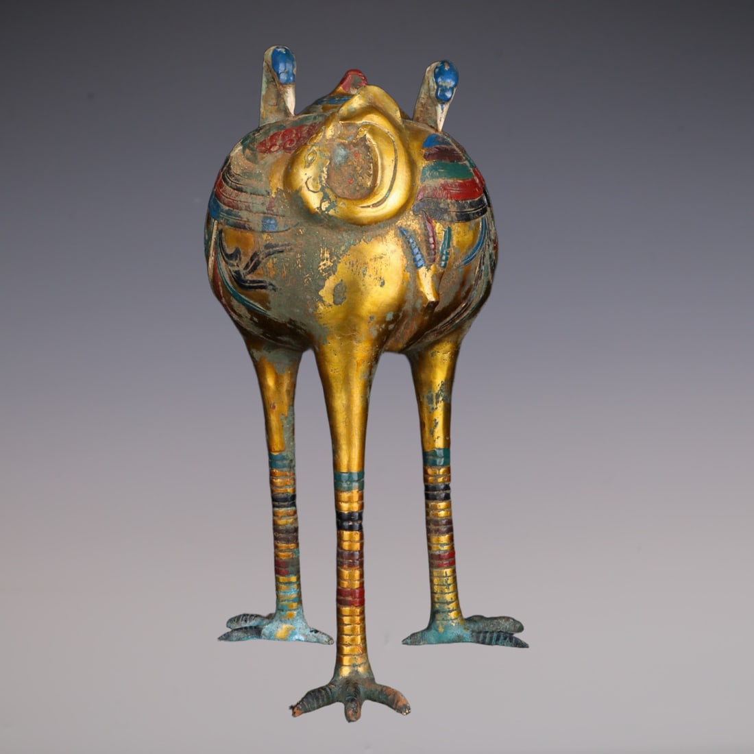 An Exquisite Gilt Bronze Painted Color Double-Ears and Tripod Censer: An Exquisite Gilt Bronze Painted Color Double-Ears and Tripod Censer Han Dynasty, China Size:23cmx38cm Weight:3980g (The Dimensions Of All Batches Are Manually Measured.If You Need More Detailed