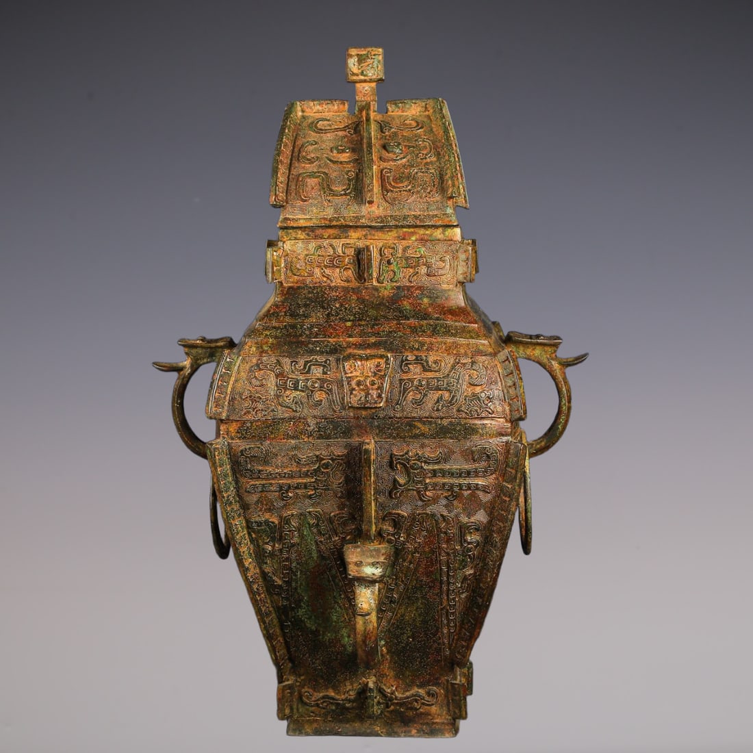 An Exquisite Bronze Beast-Face Pattern With Inscription Vase (1 of 9)