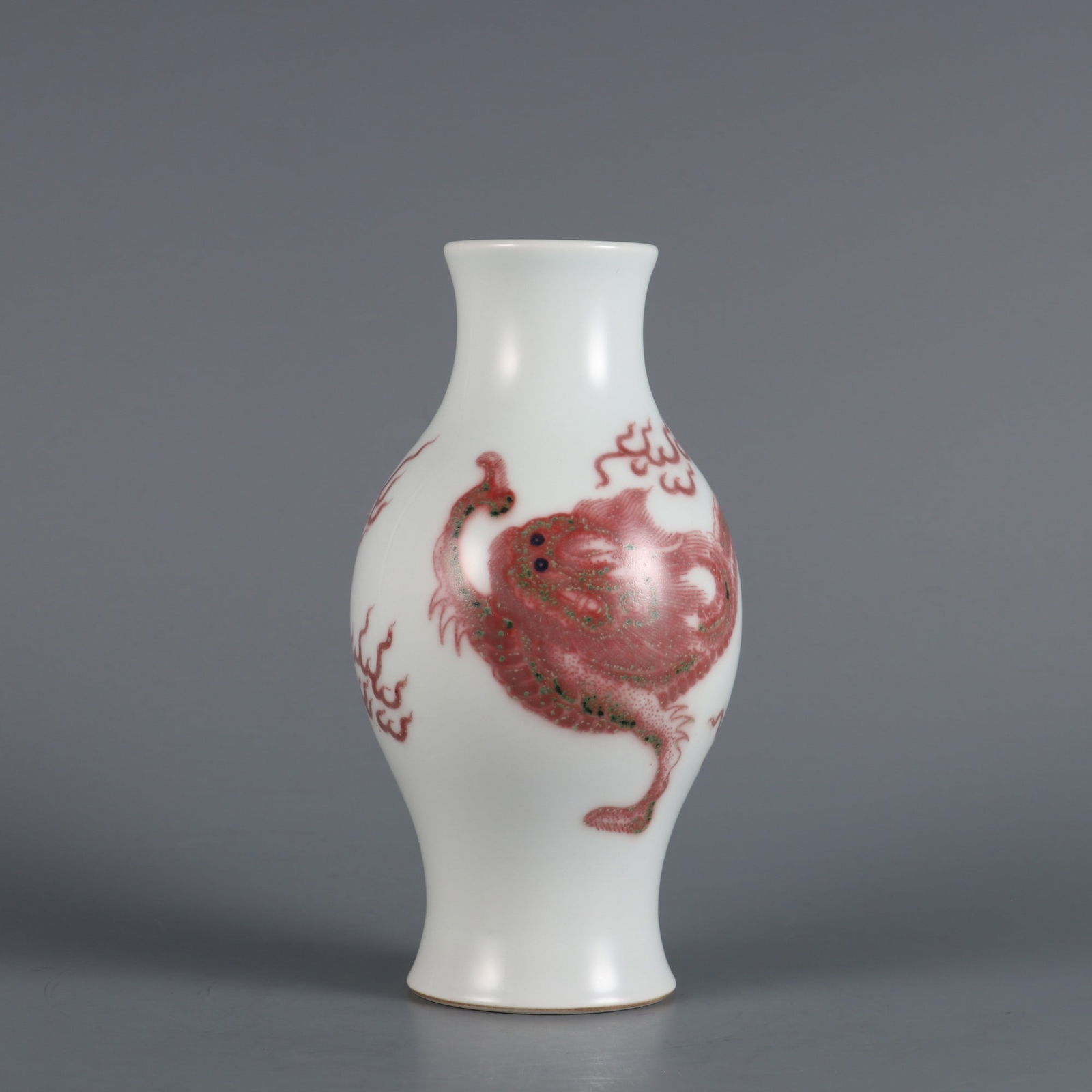 An Exquisite Underglaze-Red Dragon Pattern Vase: An Exquisite Underglaze-Red Dragon Pattern Vase Qing Dynasty, China Yongzheng Six-character Mark Size:16cmx8cm (The Dimensions Of All Batches Are Manually Measured.If You Need More Detailed Informatio