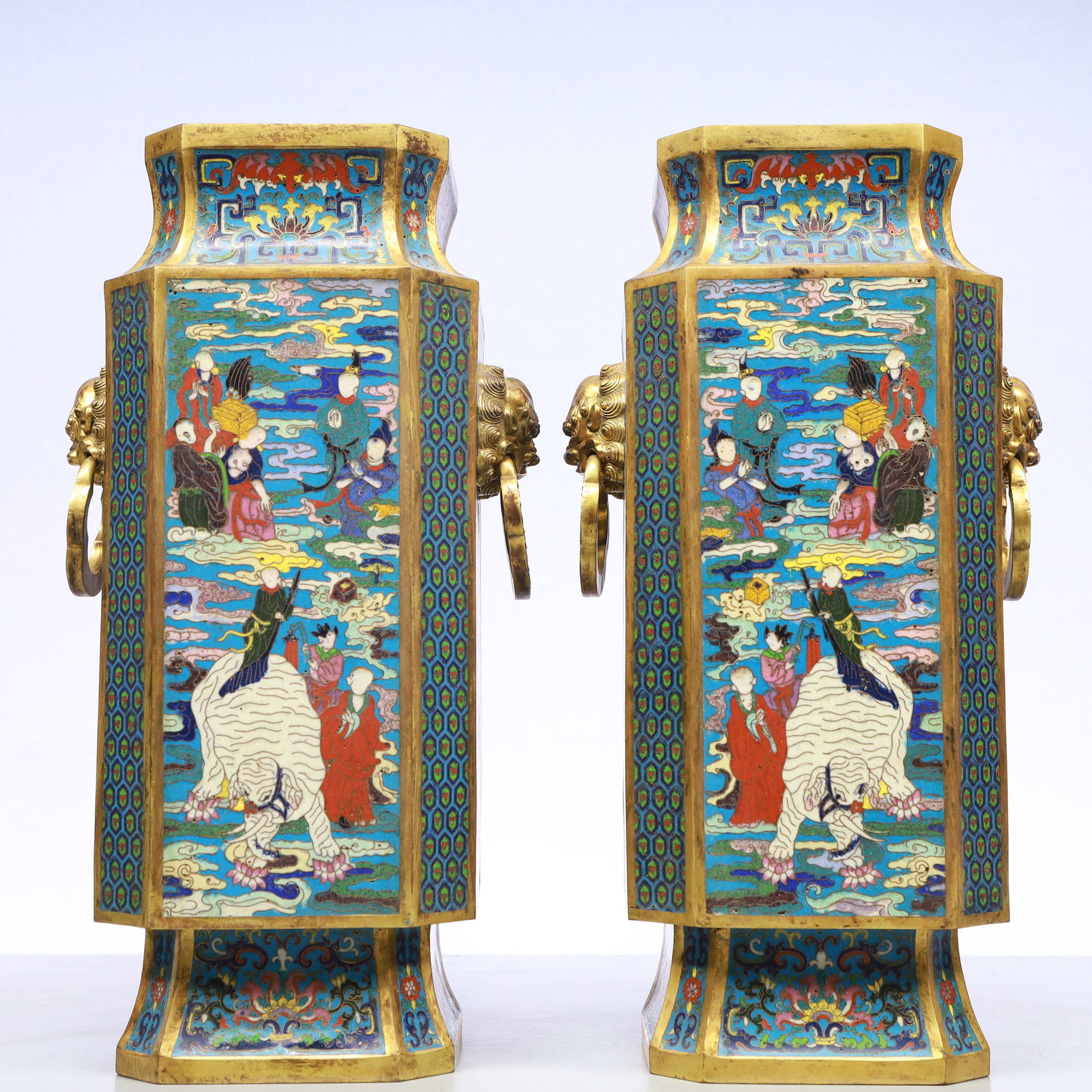 A Exquisite A pair of Cloisonne Lotus Pattern Character and Story Pattern Double-Ears Vase: A Exquisite A pair of Cloisonne Lotus Pattern Character and Story Pattern Double-Ears Vase Qing Dynasty, China Qianlong Four-character Mark Size:19cmx37cm Weight:8650g (The Dimensions Of All