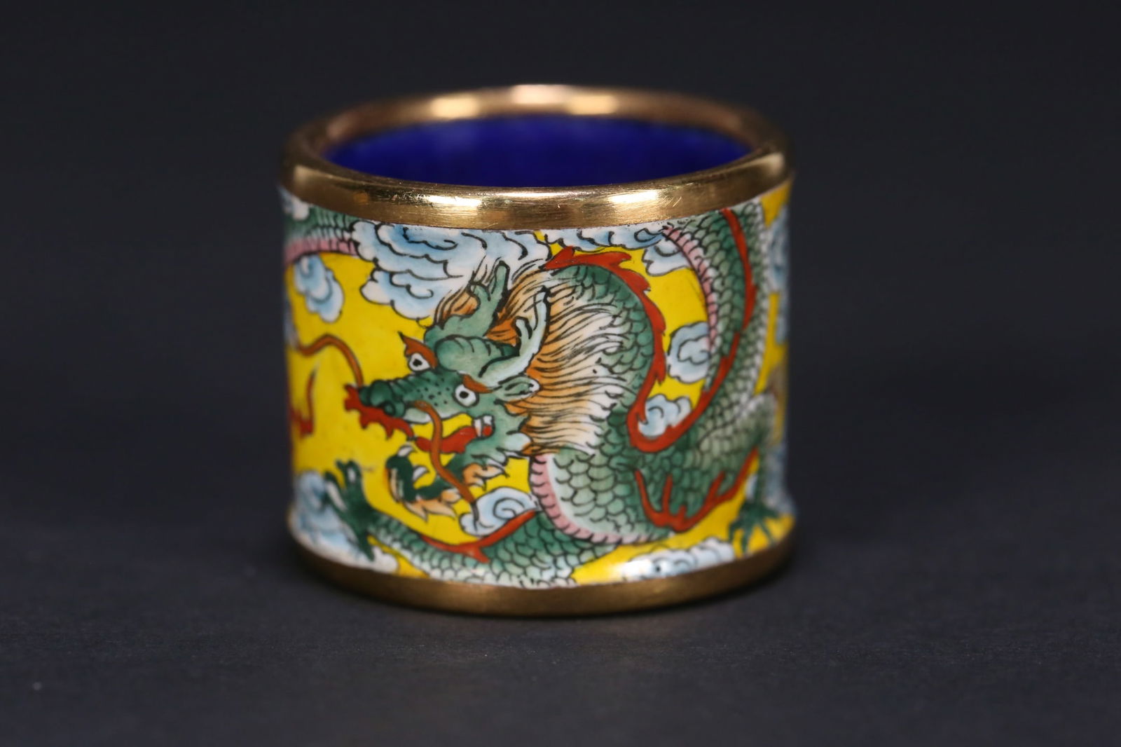 An Exquisite Cloisonne Dragon Pattern Ring: An Exquisite Cloisonne Dragon Pattern Ring Qing Dynasty, China Size:(inside diameter)2.4cm Size:2.5cm Weight:28.8g (The Dimensions Of All Batches Are Manually Measured.If You Need More Detailed