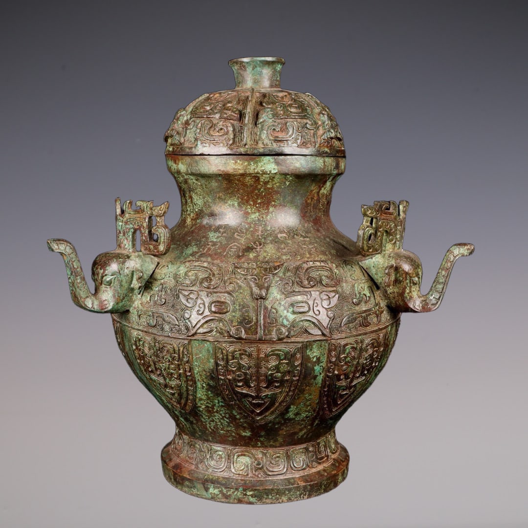 An Exquisite Bronze Beast-Face Pattern With Inscription Jar (1 of 9)