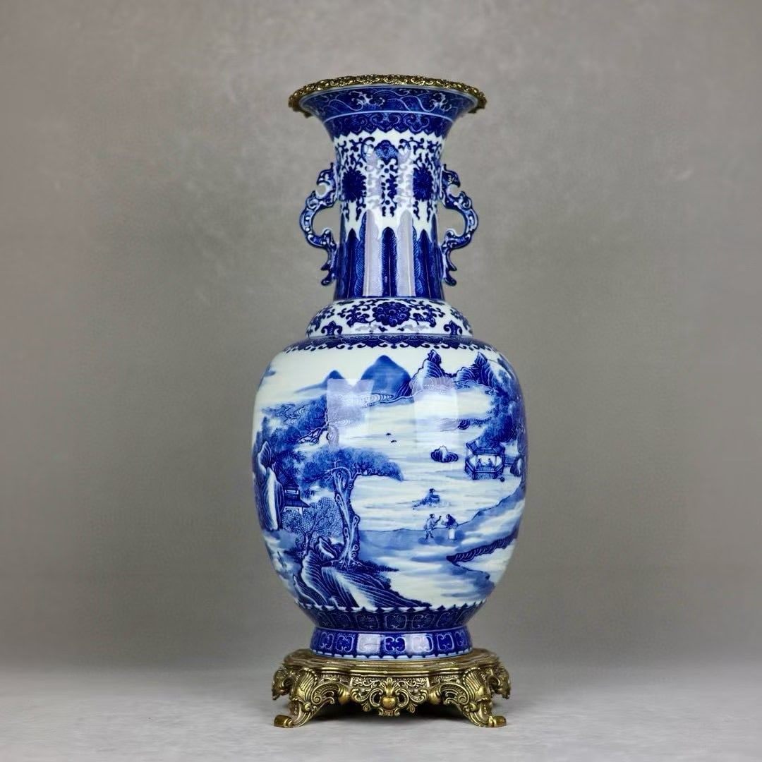 An Exquisite Blue and White Inlaid Bronze Lotus Pattern Landscape Pattern Double-Ears Vase: An Exquisite Blue and White Inlaid Bronze Lotus Pattern Landscape Pattern Double-Ears Vase Qing Dynasty, China Yongzheng Six-character Mark Size:49cmx20cm (The Dimensions Of All Batches Are