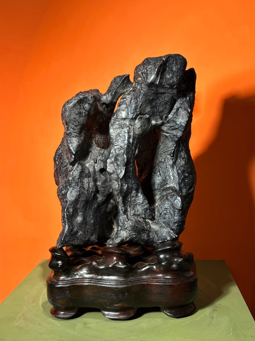 An Exquisite Lingbi Stone Ornament: An Exquisite Lingbi Stone Ornament Qing Dynasty, China Size:47cmx32cmx24cm (The Dimensions Of All Batches Are Manually Measured.If You Need More Detailed Information, Please Contact Our Customer