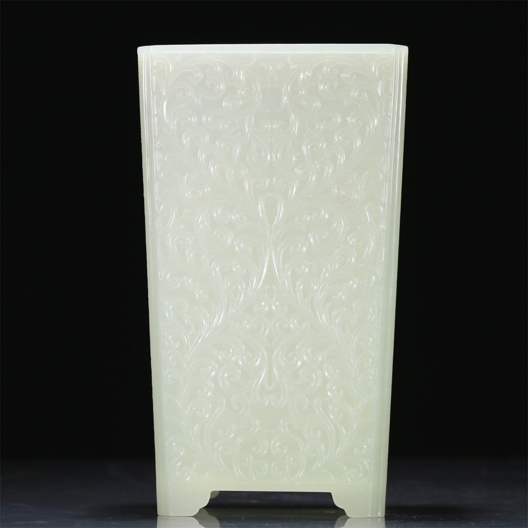 An Exquisite White Jade 'Flower' Vase: An Exquisite White Jade 'Flower' Vase. Chinese Qing Dynasty. Size:8.6cmx7cmx15cm (The Dimensions Of All Batches Are Manually Measured.If You Need More Detailed Information, Please Contact Our