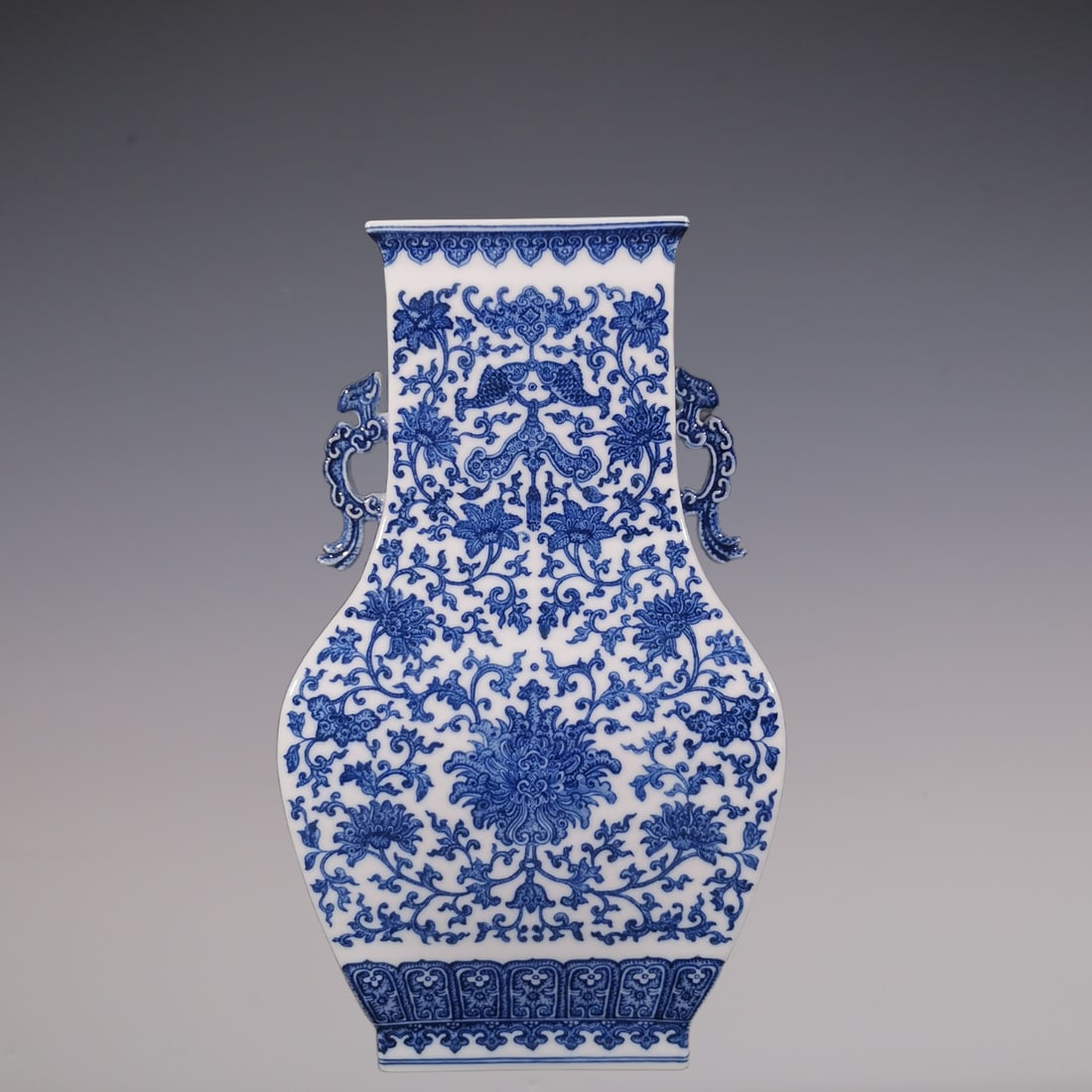 An Exquisite Blue and White Lotus Pattern Double-Ears Vase: An Exquisite Blue and White Lotus Pattern Double-Ears Vase Qing Dynasty, China Qianlong Six-character Mark Size:38.4cmx22cm (The Dimensions Of All Batches Are Manually Measured.If You Need More